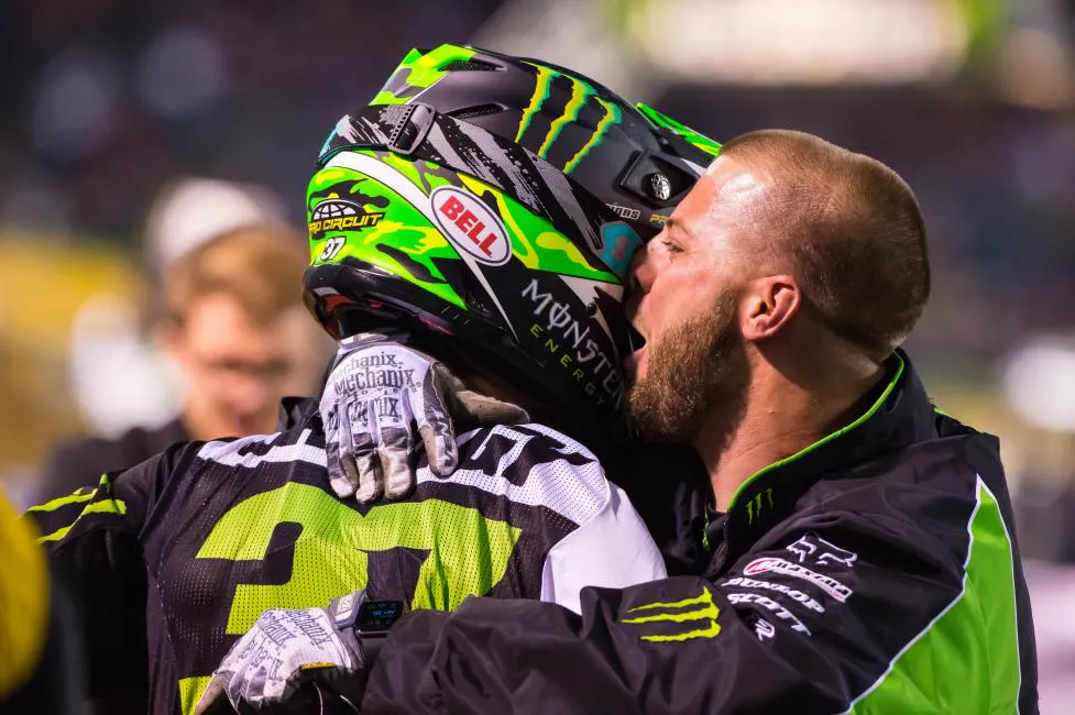 Pure joy for Joey Savatgy and his mechanic after his first career 250SX win.