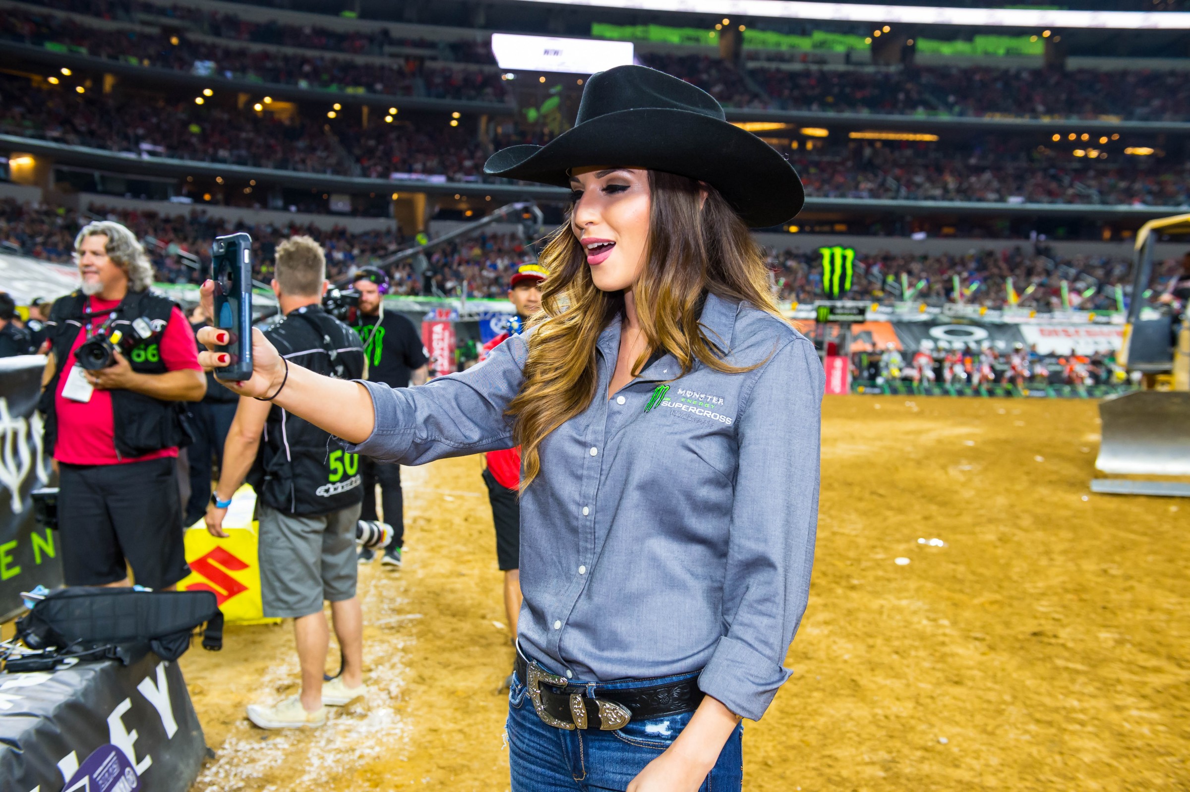 Okay, she may be actually taking a photo of someone else here, but it's close enough.