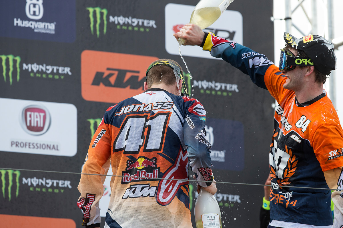 Herlings (right) celebrates win number 50 with teammate Pauls Jonass.
