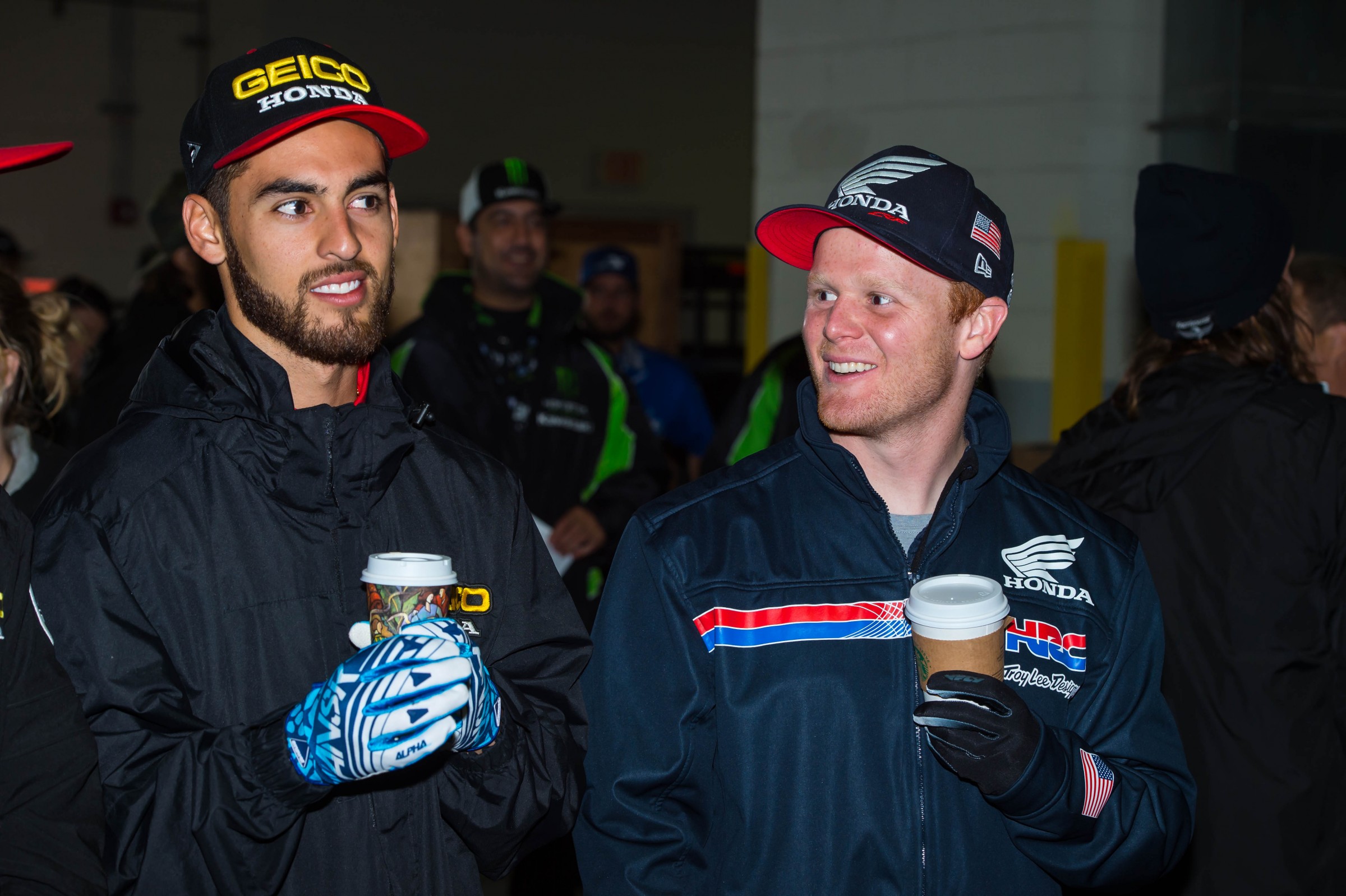 Fellow Oklahomans Justin Bogle (left) and Trey Canard enjoy a laugh, and some coffee.