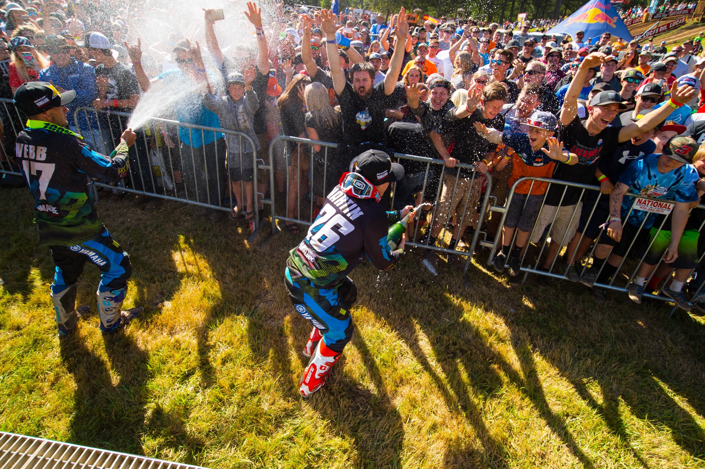 Martin and teammate Cooper Webb celebrate podium performances.