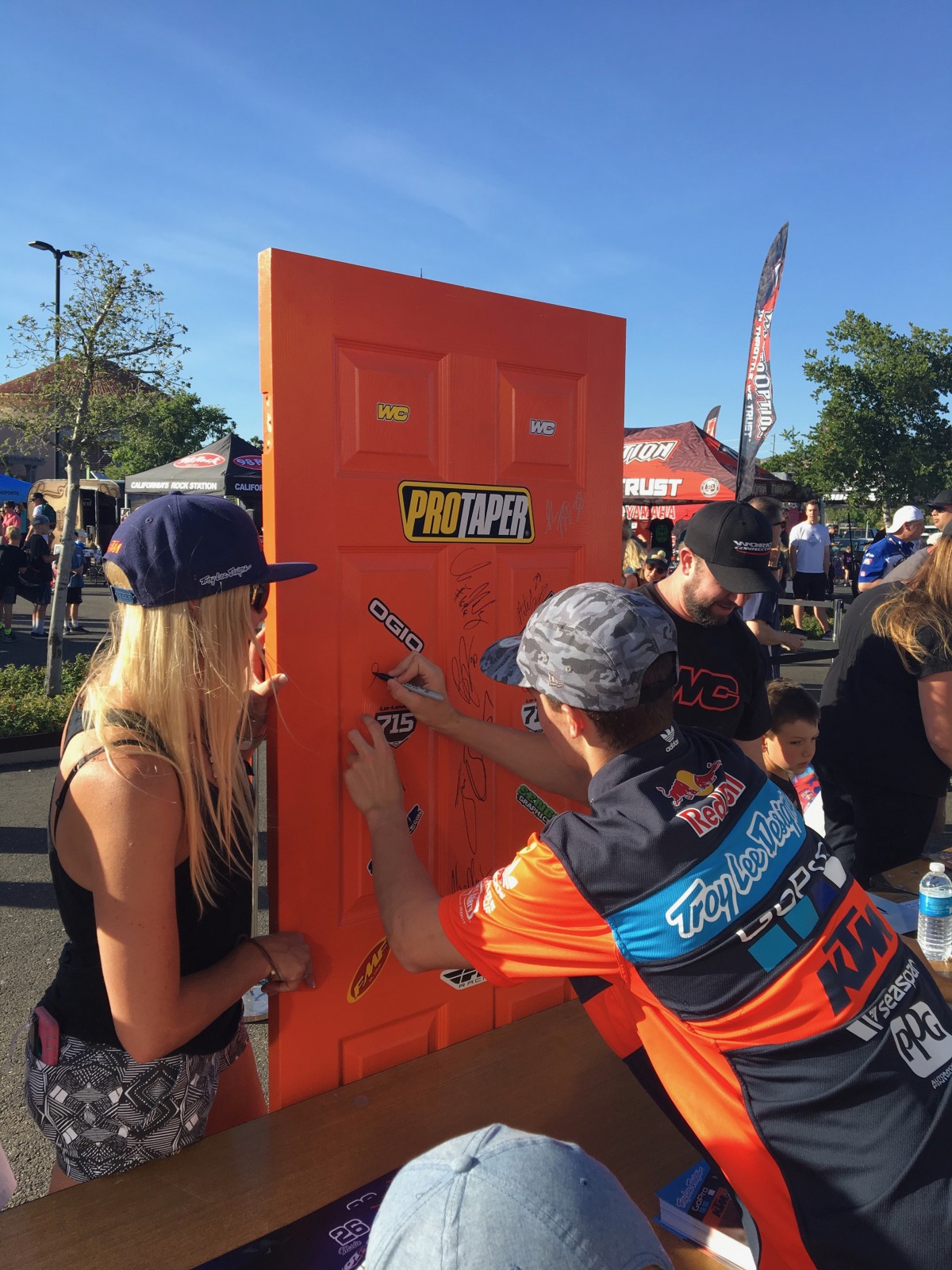 Sean Cantrell has his first pro moment, signing a bedroom door that a young fan brought to last night's autograph signing at the Folsom Plaza.