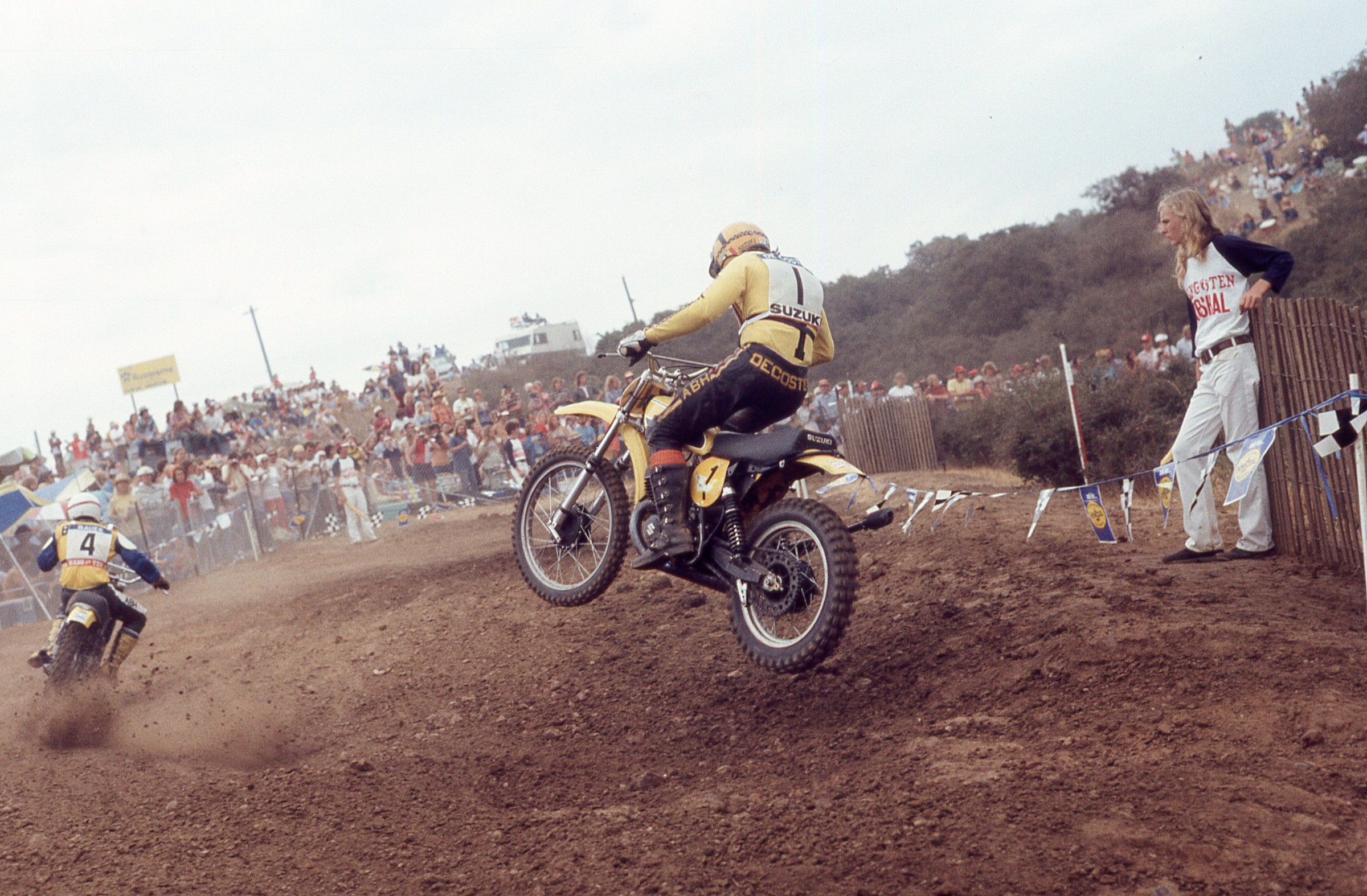 Roger DeCoster chases after Maico rider Willi Bauer.