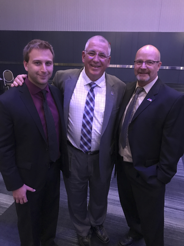 The AMA's Mike Pelletier and Kevin Crowther and MX Sports' Tim Cotter.