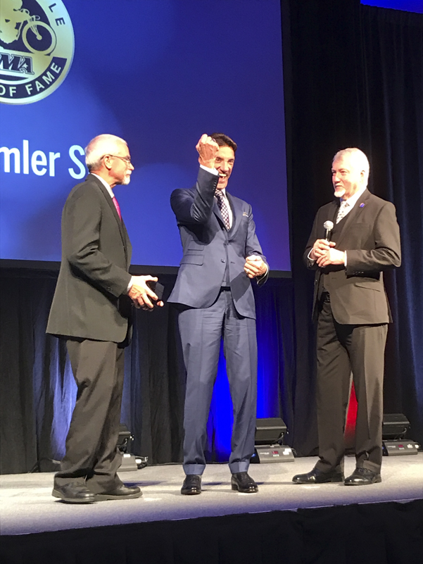 Donnie Emler celebrates the moment he is inducted with his Hall of Fame ring.