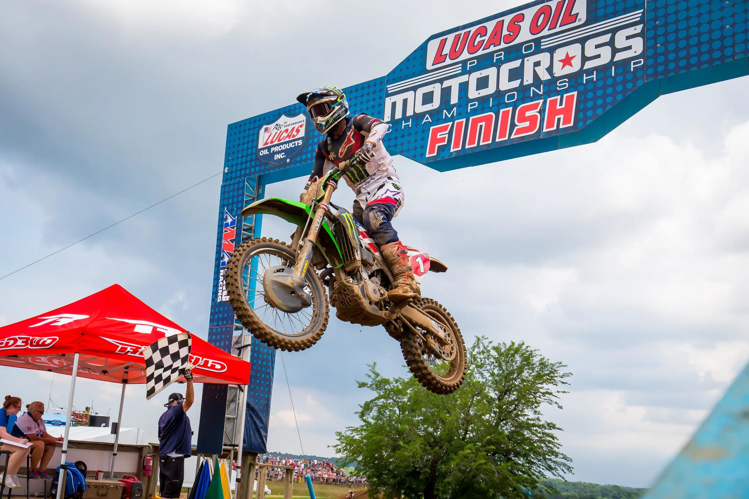 Tomac taking the checkered flag in the first 450 Class moto.
