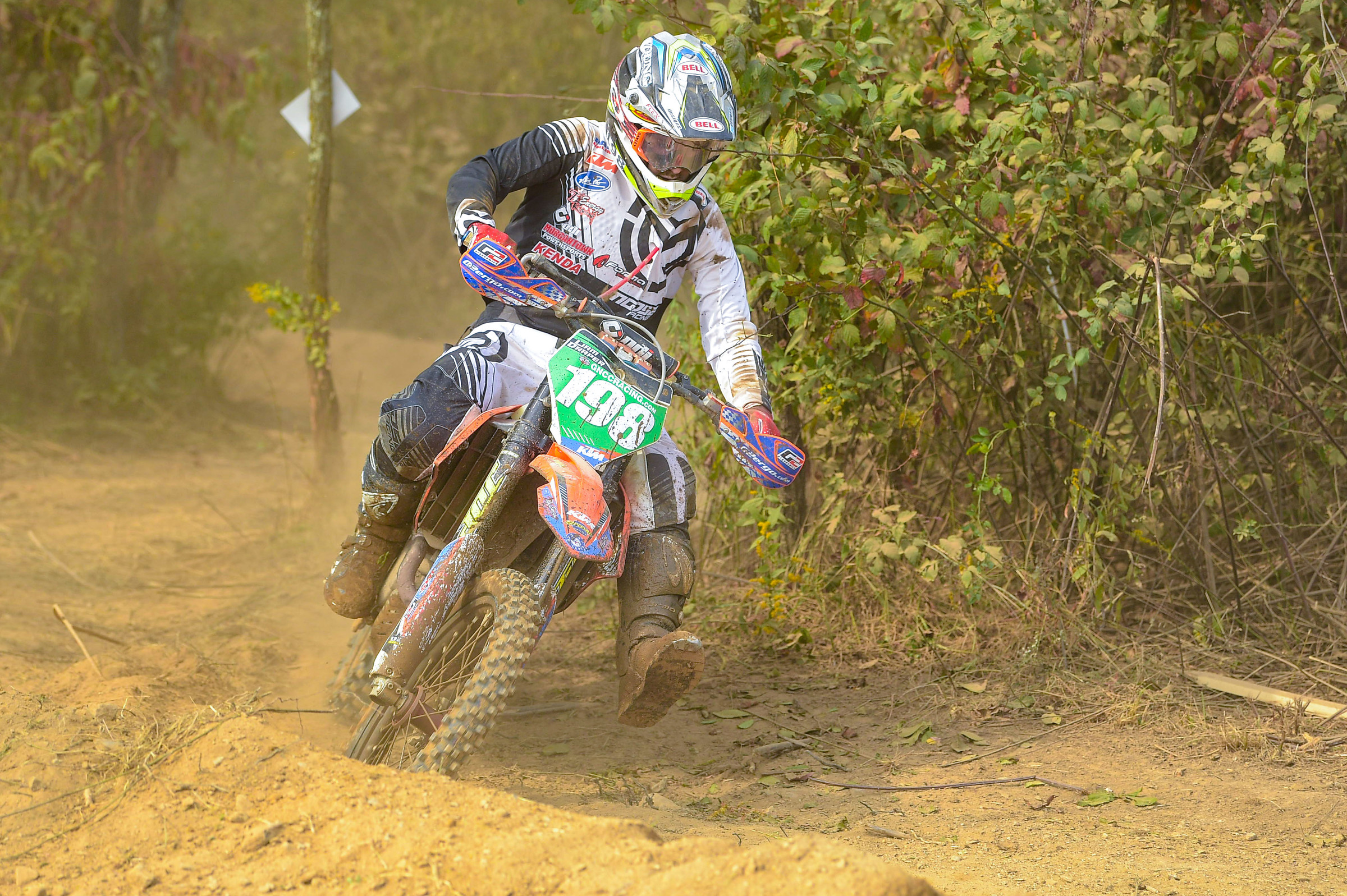 Draper works his way through a twisty, dusty woods section.