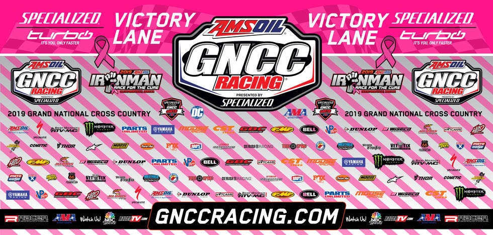 The Ironman GNCC pink backdrop will be auctioned off Saturday evening.