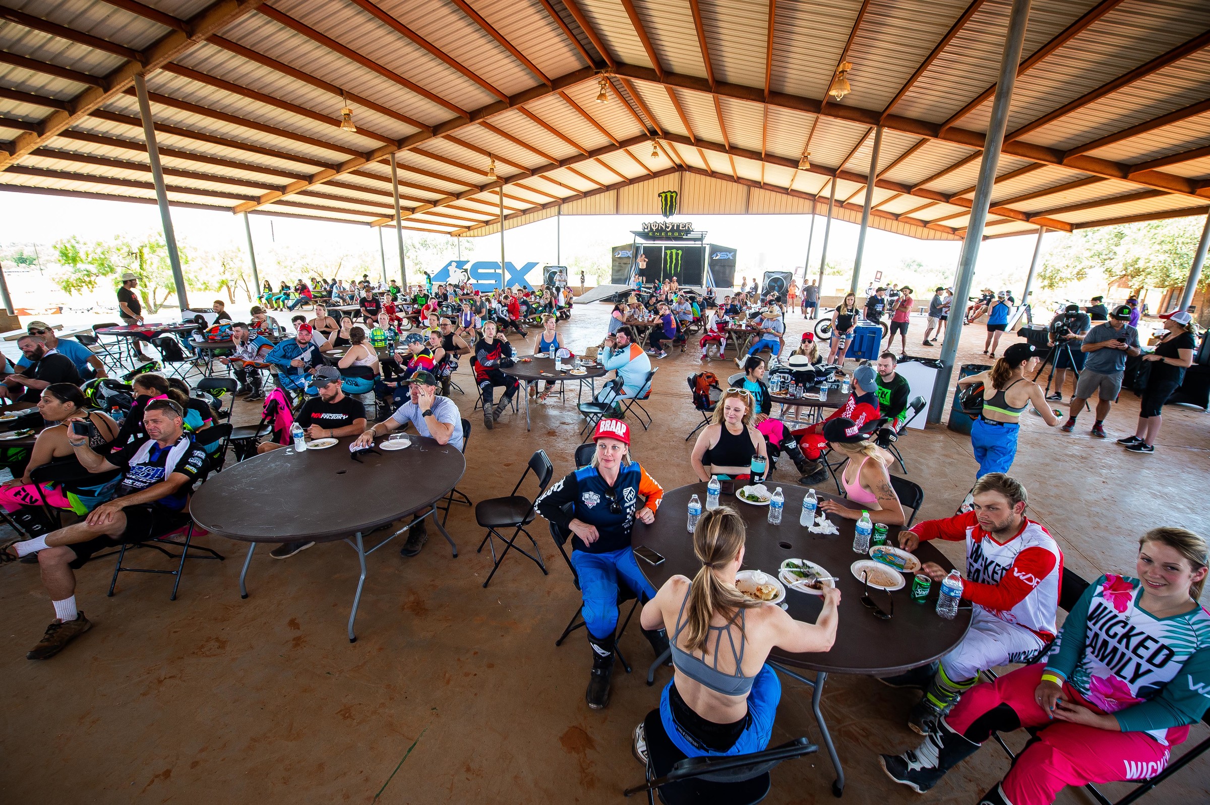 Campers grab a bite to eat and listen in to what Peick, Jarvis, and others had to say.