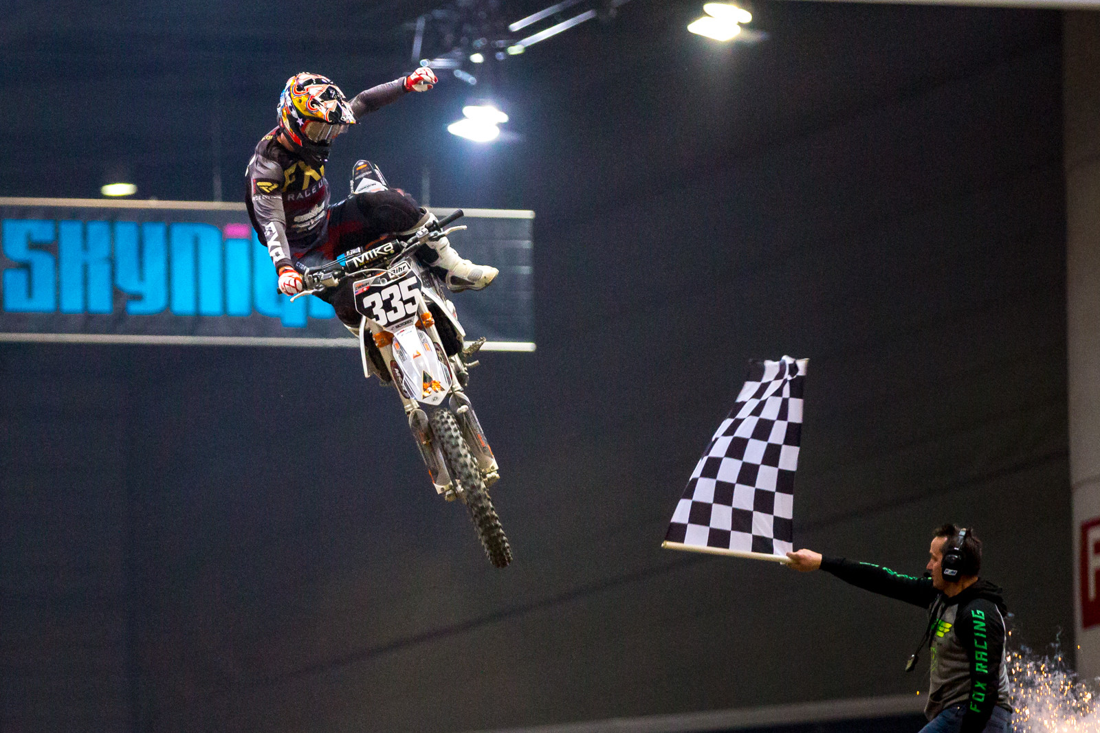 Crown taking the checkered flag.