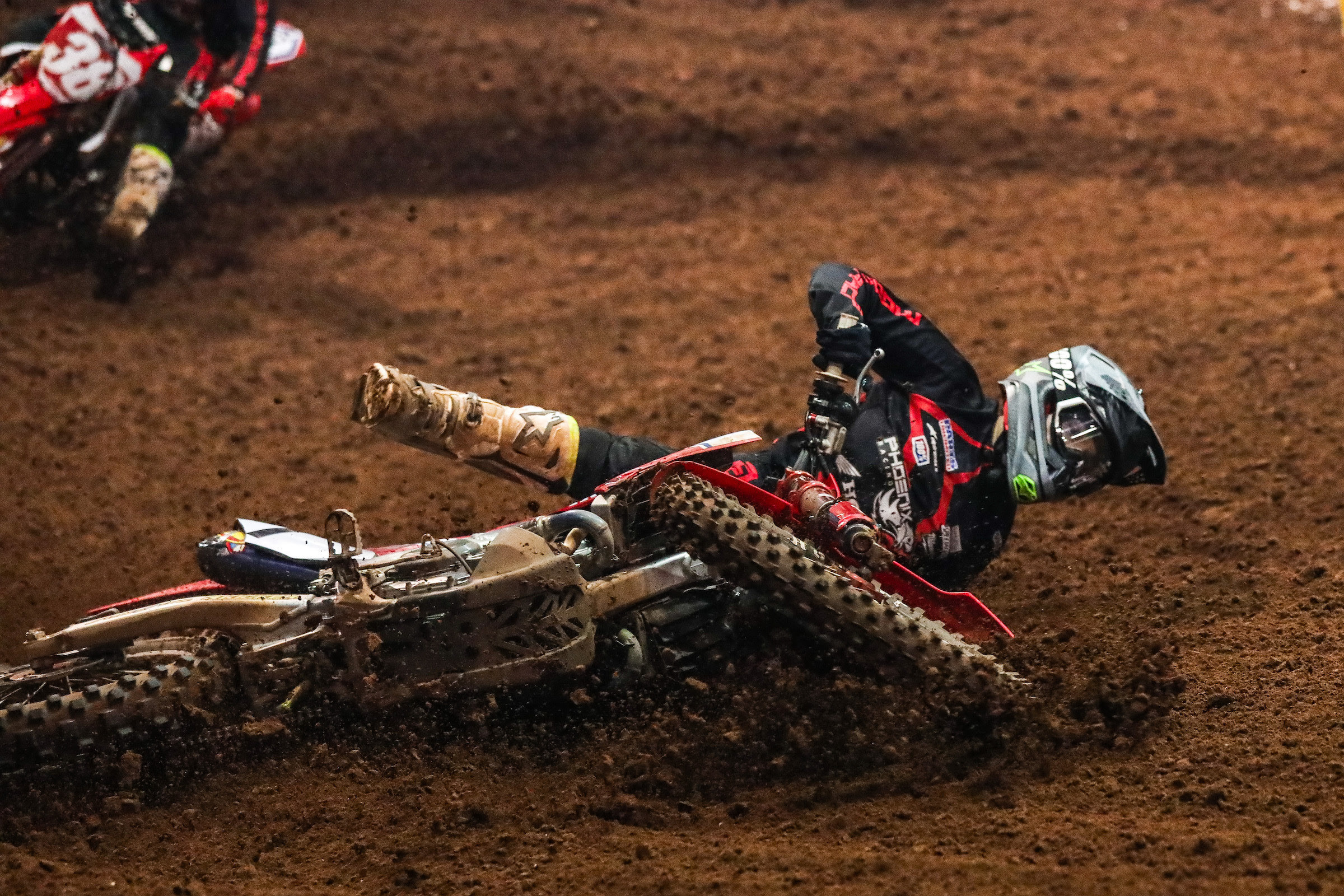 Phoenix Racing Honda Team Rider, Jace Owen, loses the lead in the 450 Pro Main on Saturday night after going down on the track.