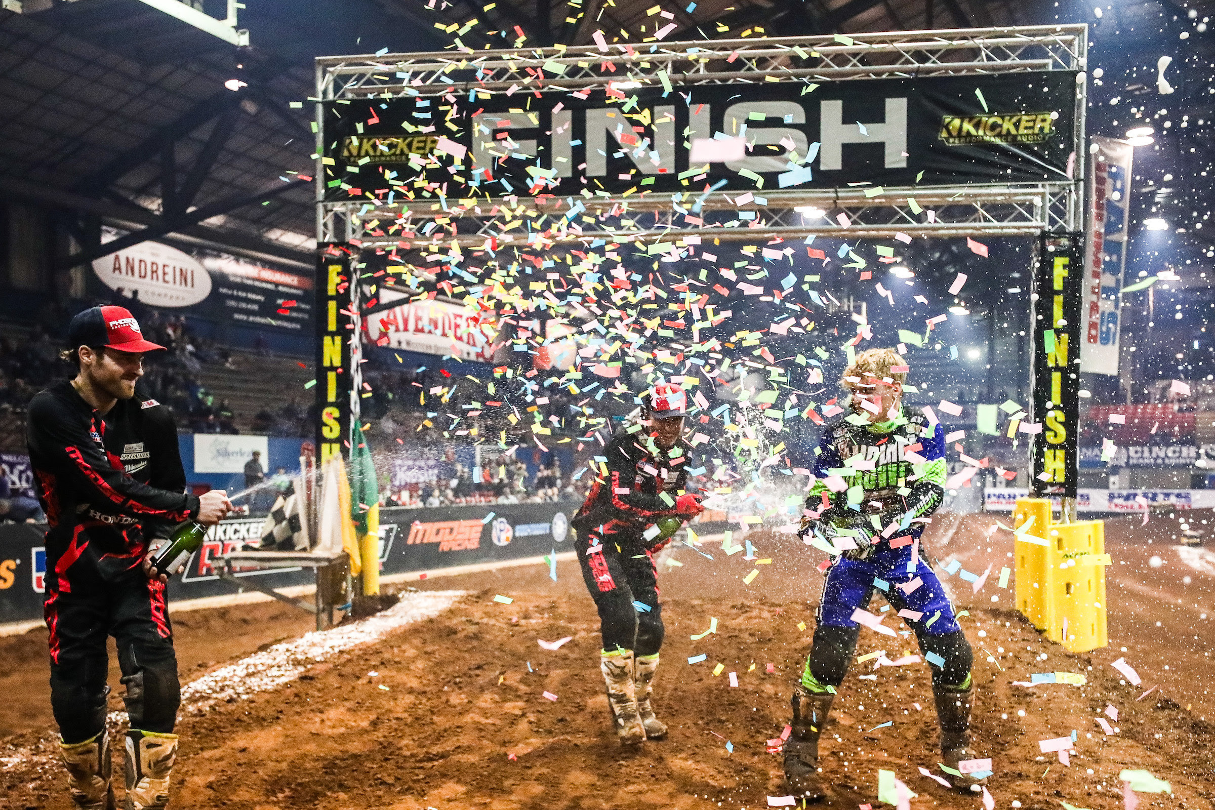 From the left, Jace Owen, Kyle Peters, and Dustin Winter celebrate making the podium in the 450 Pro Main in Round 5.