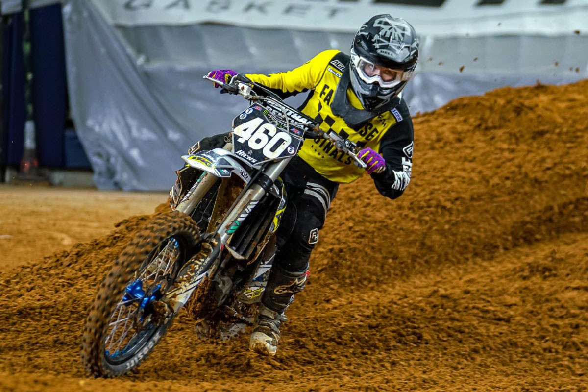 Michael Hicks riding his way to the top step on the podium in a close battle with second and third place finishers Jesse Flock and Cullin Park.