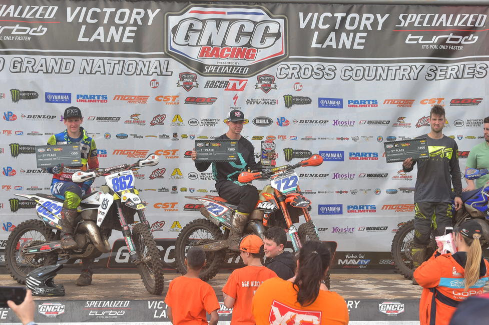 Zack Hayes (center) earned the FMF XC3 125 Pro-Am class win.