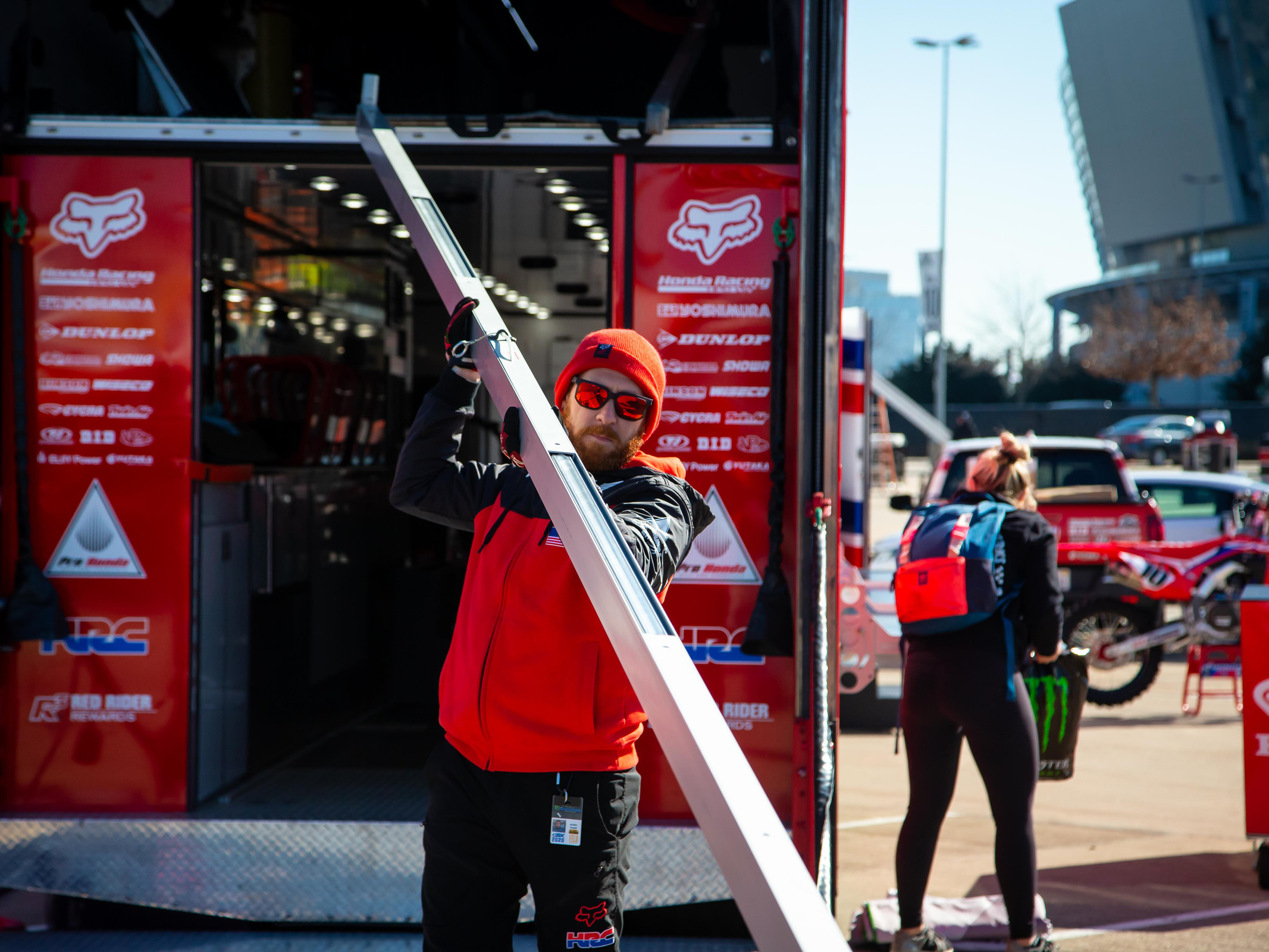Jordan Troxell works on the Honda circus tent.