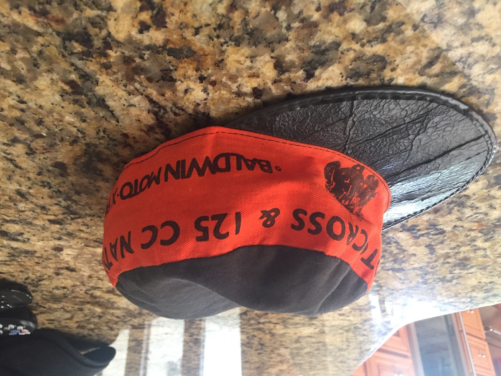 Thanks to Clifford Johnston for sending in this shot of his old painter cap from the 1974 Baldwin Inter-AMA and 125 National.