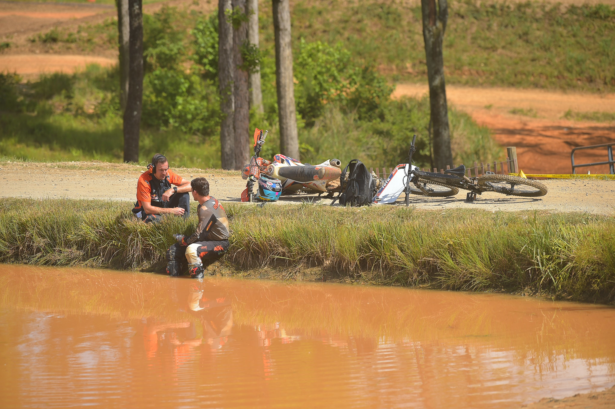 Kailub Russell rode without a drink system on a hot and humid day. Looks like he checked into this pond when it was all over!