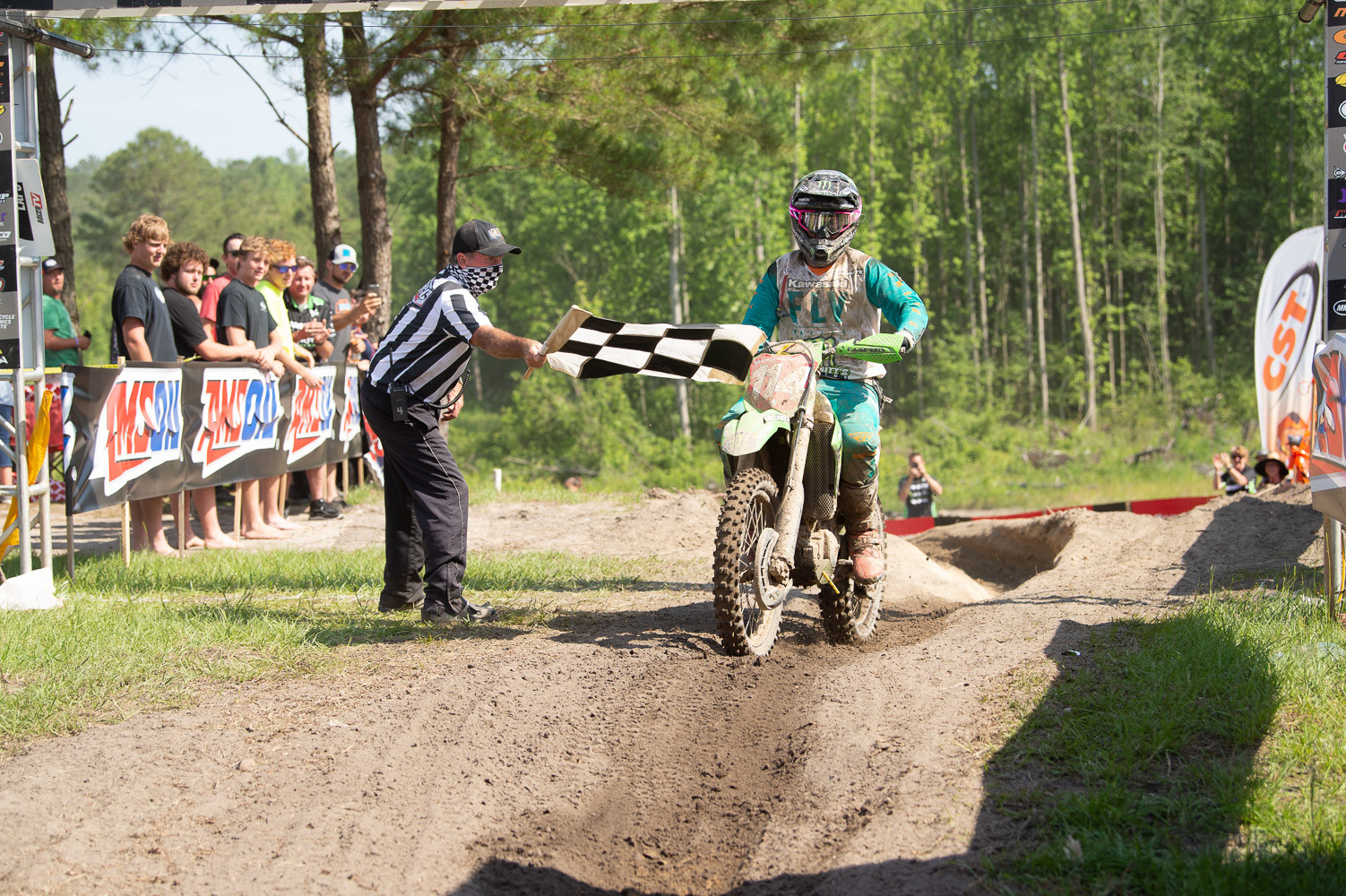 Strang taking the checkered flag.
