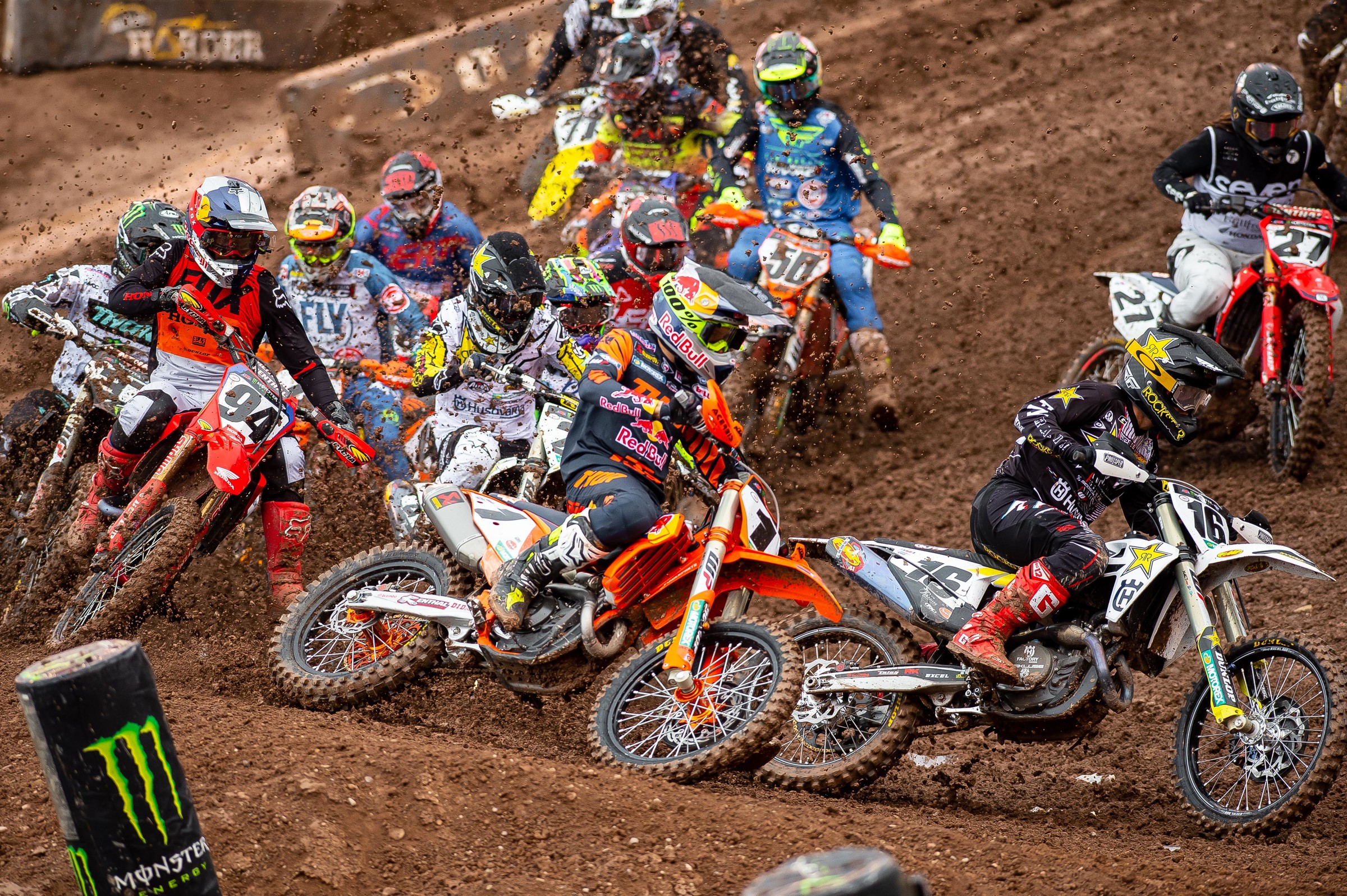 The 450SX class in the first turn. What you can't see is Tomac salvaging a third from way on the inside.