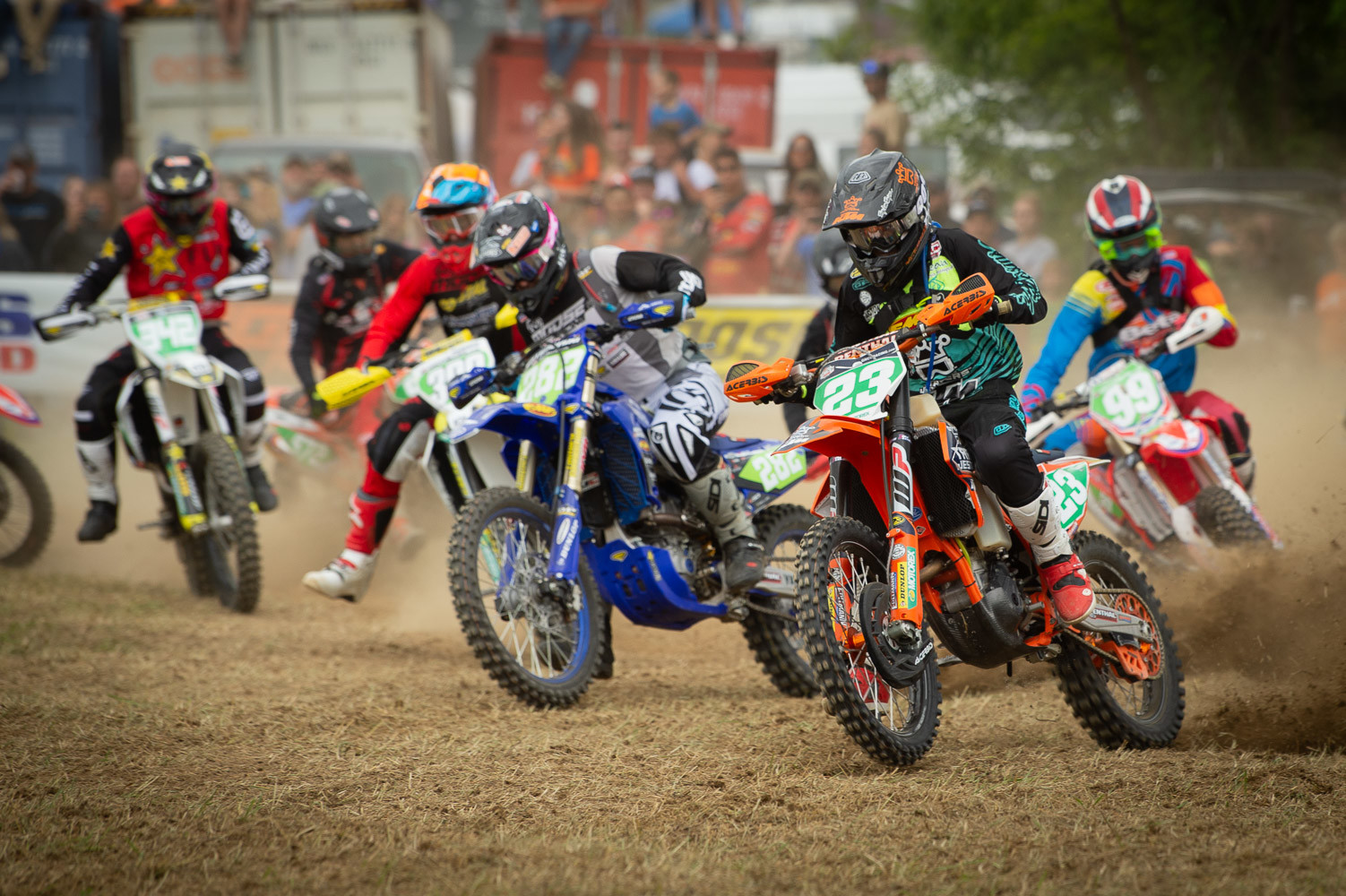 Simon Johnson (#23) leading the XC2 class through the first turn.