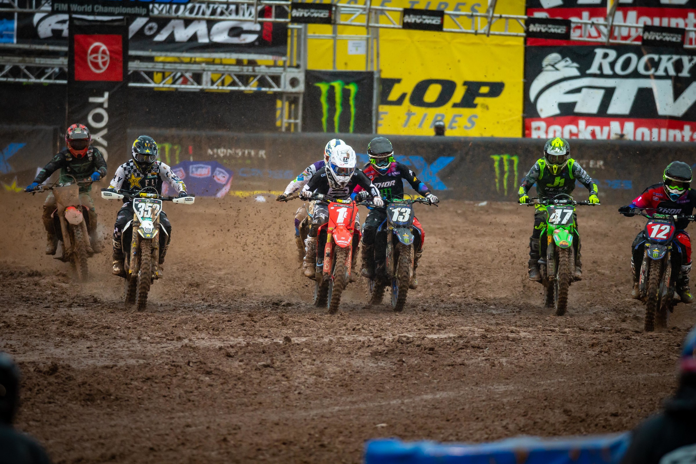 The 250SX East Region riders charge towards turn one.