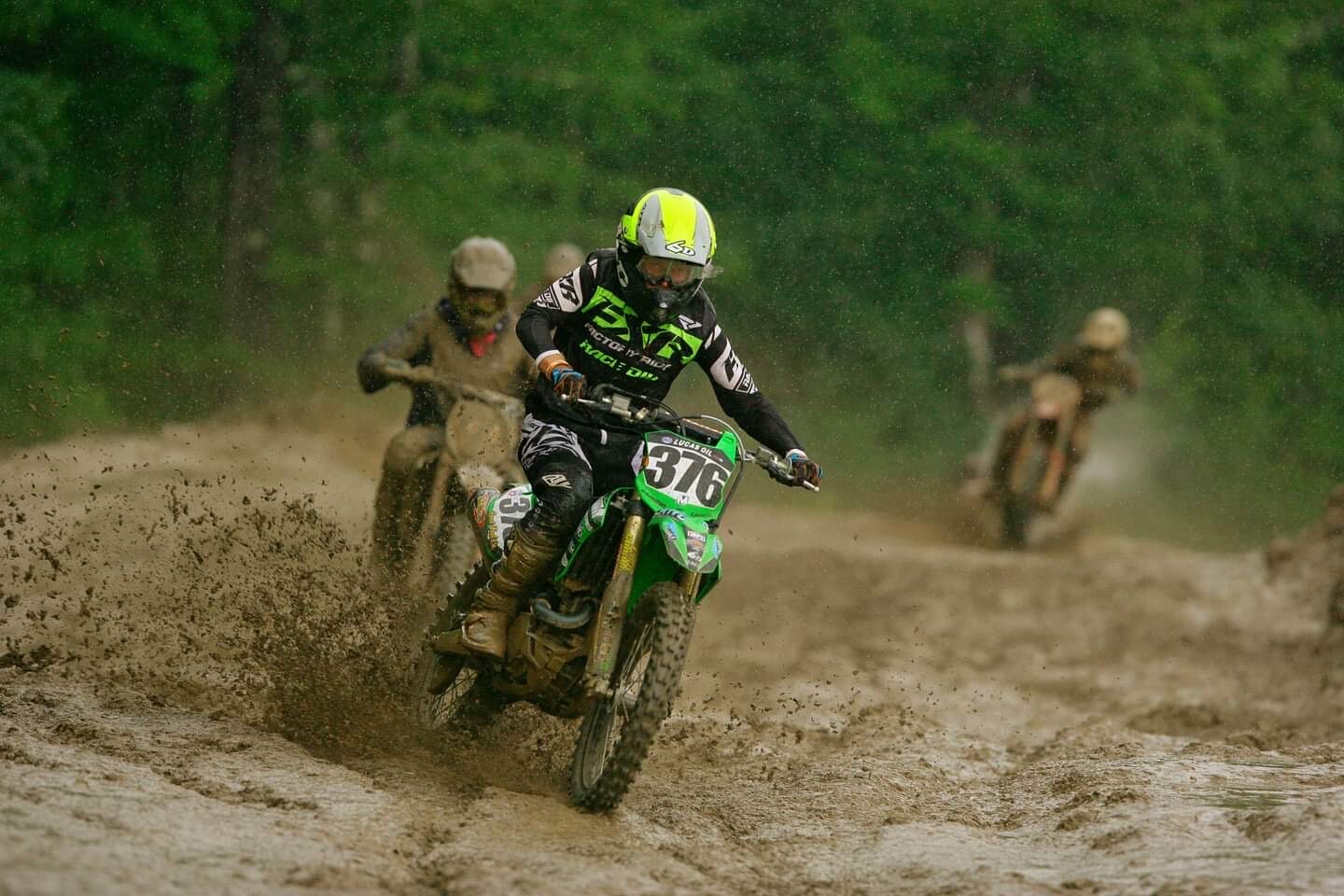 Chris Canning sloshing through the muddy conditions.