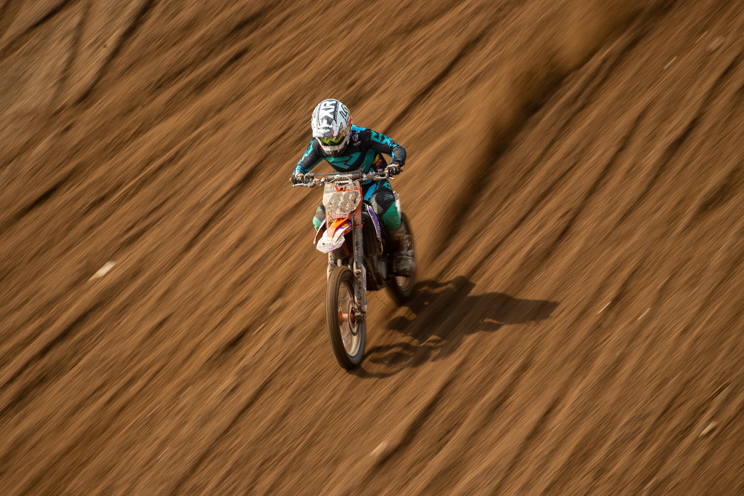 Miller sitting without a seat.