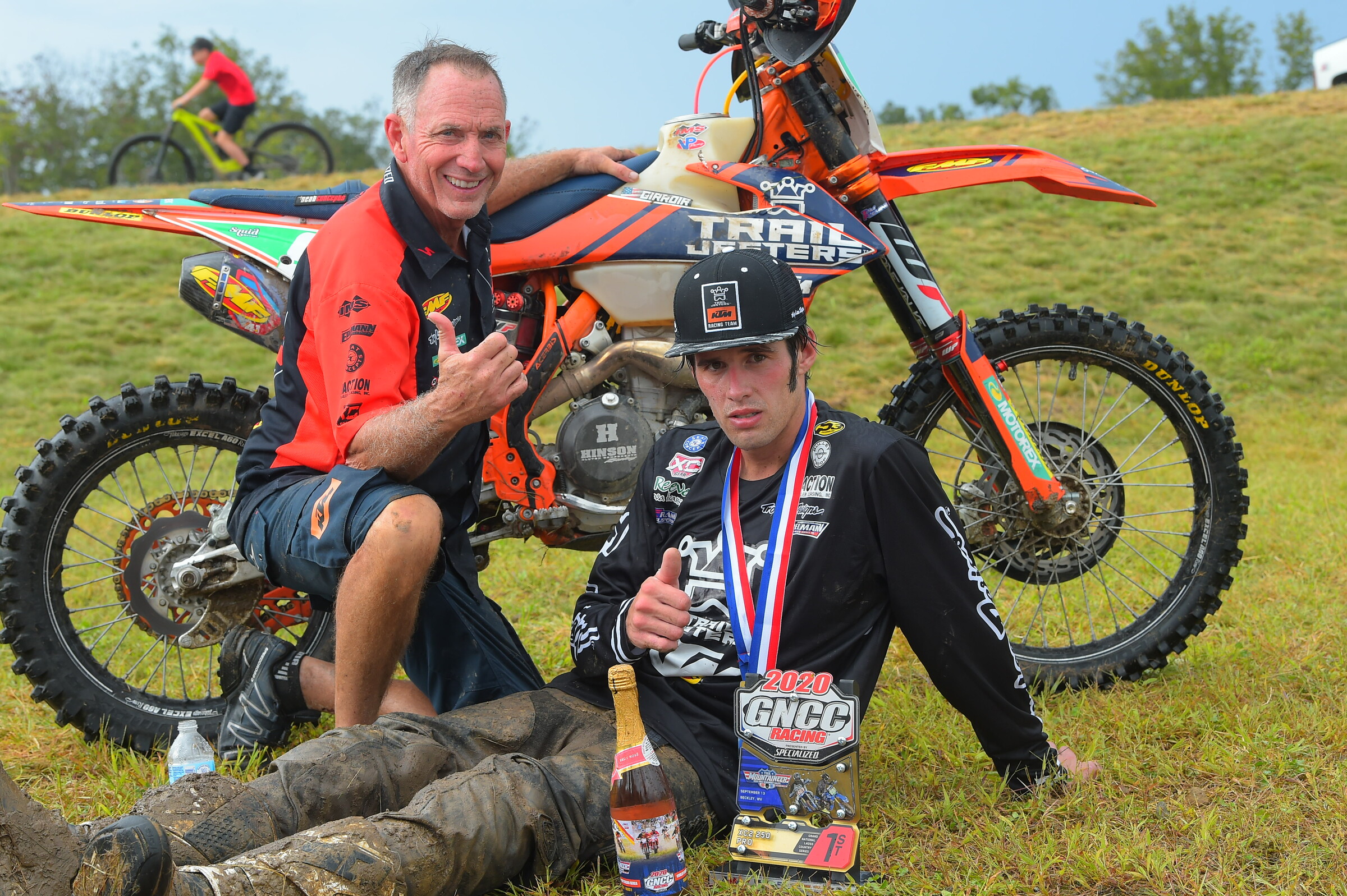Mechanic Woody Bramlett and a worn-out Girroir celebrate the win. 