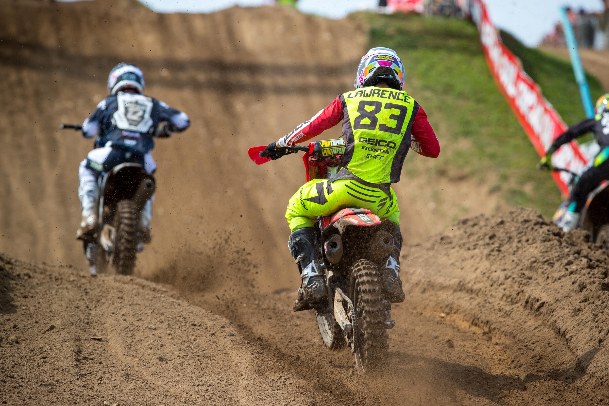 Lawrence chasing down Shane McElrath in 250 Moto 1 at RedBud 2.