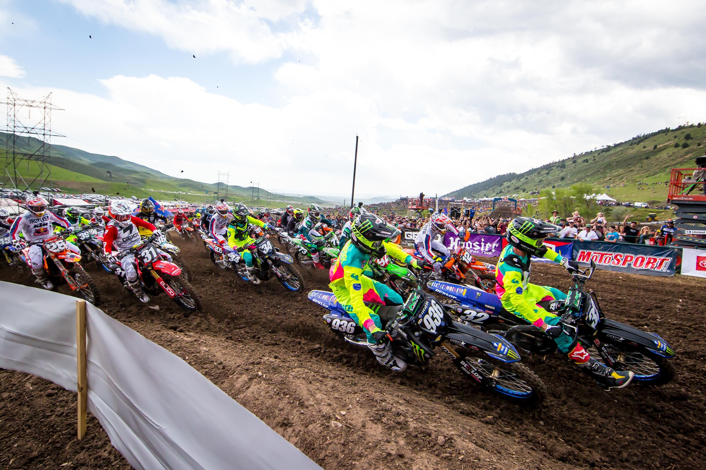 Ty Masterpool (#936) and Justin Cooper (#32) lead the 250 Class into the first turn at the 2019 Thunder Valley National.