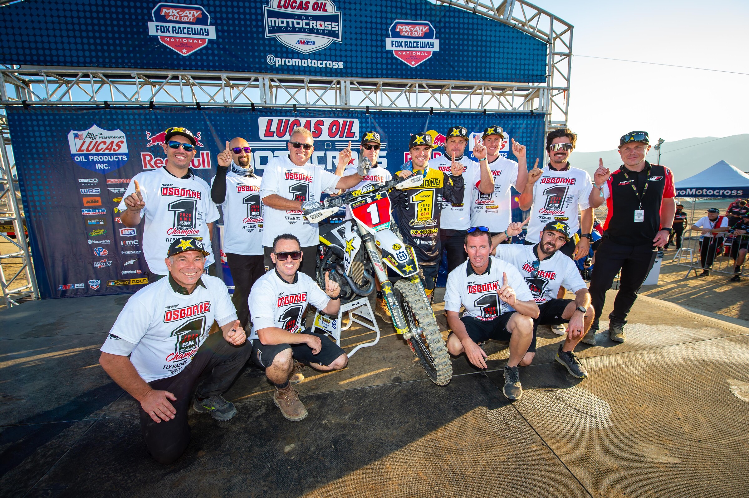 The Rockstar Energy Husqvarna team celebrate Wacko's first premier class title.