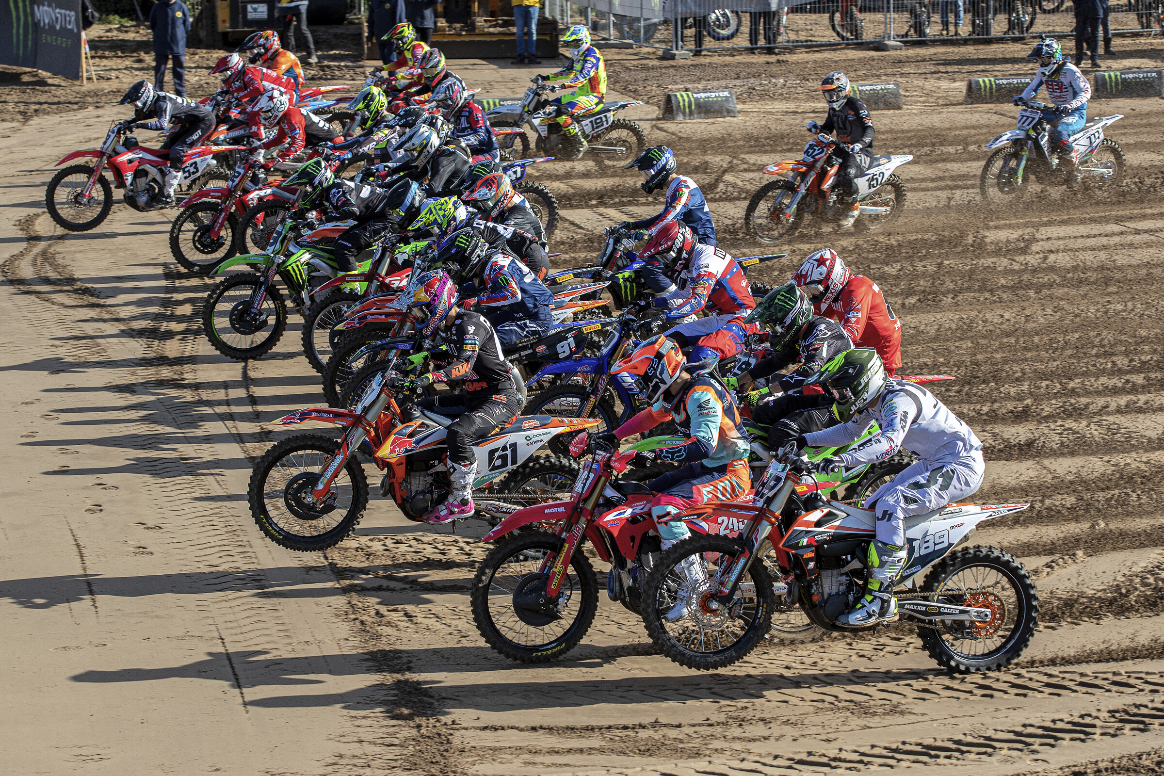 The MXGP class heading for the first turn.