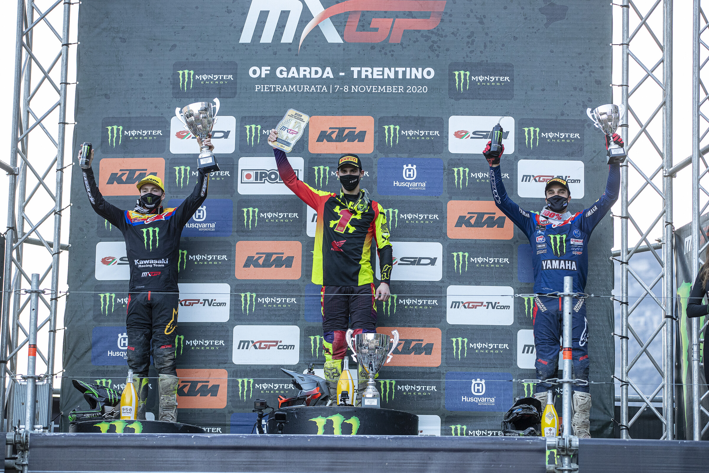 Gautier Paulin (right, 4-3 for third overall), Romain Febvre (left, 1-2 for second overall), and Tim Gajser (middle, 2-1 for first overall). Paulin earned a podium finish in his last MXGP race as he looks ahead towards retirement.