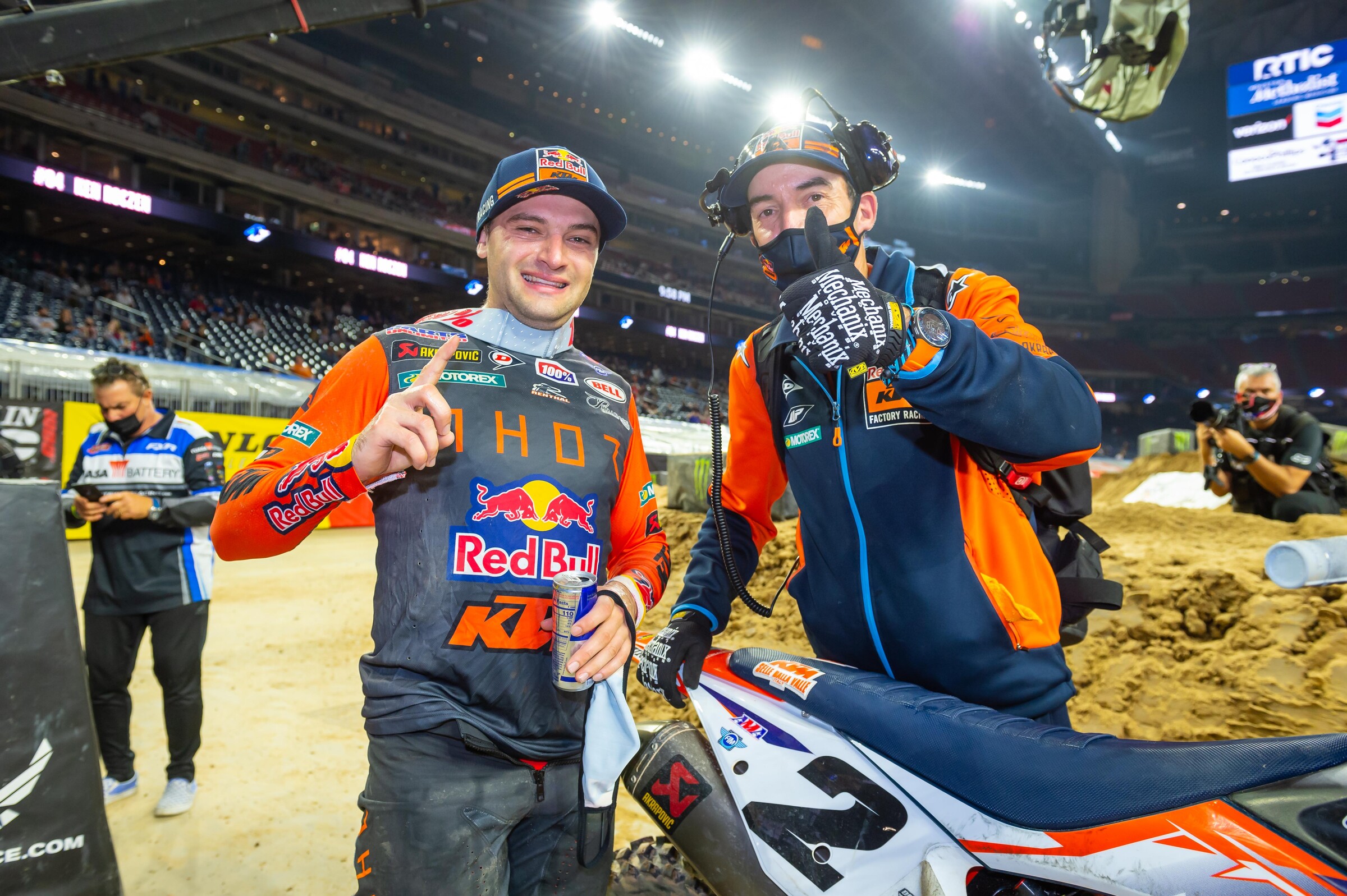 Cooper Webb and Carlos Rivera celebrating Webb's win at the 2021 Houston 3 Supercross.