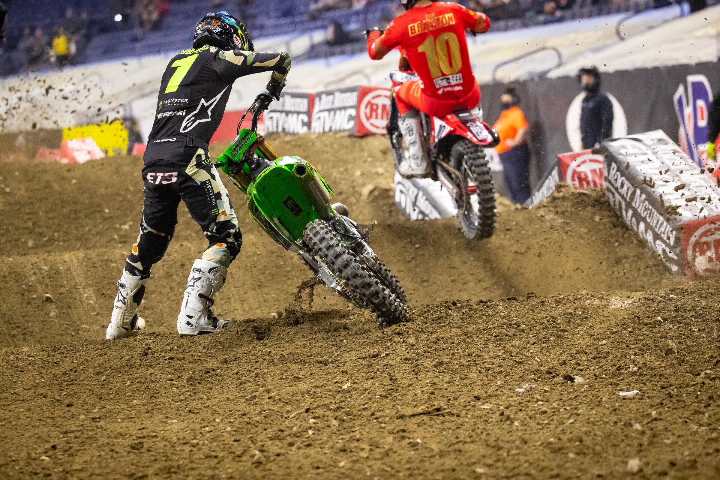 After going down in a turn in his heat race, Eli Tomac picks up his Kawasaki KX450.