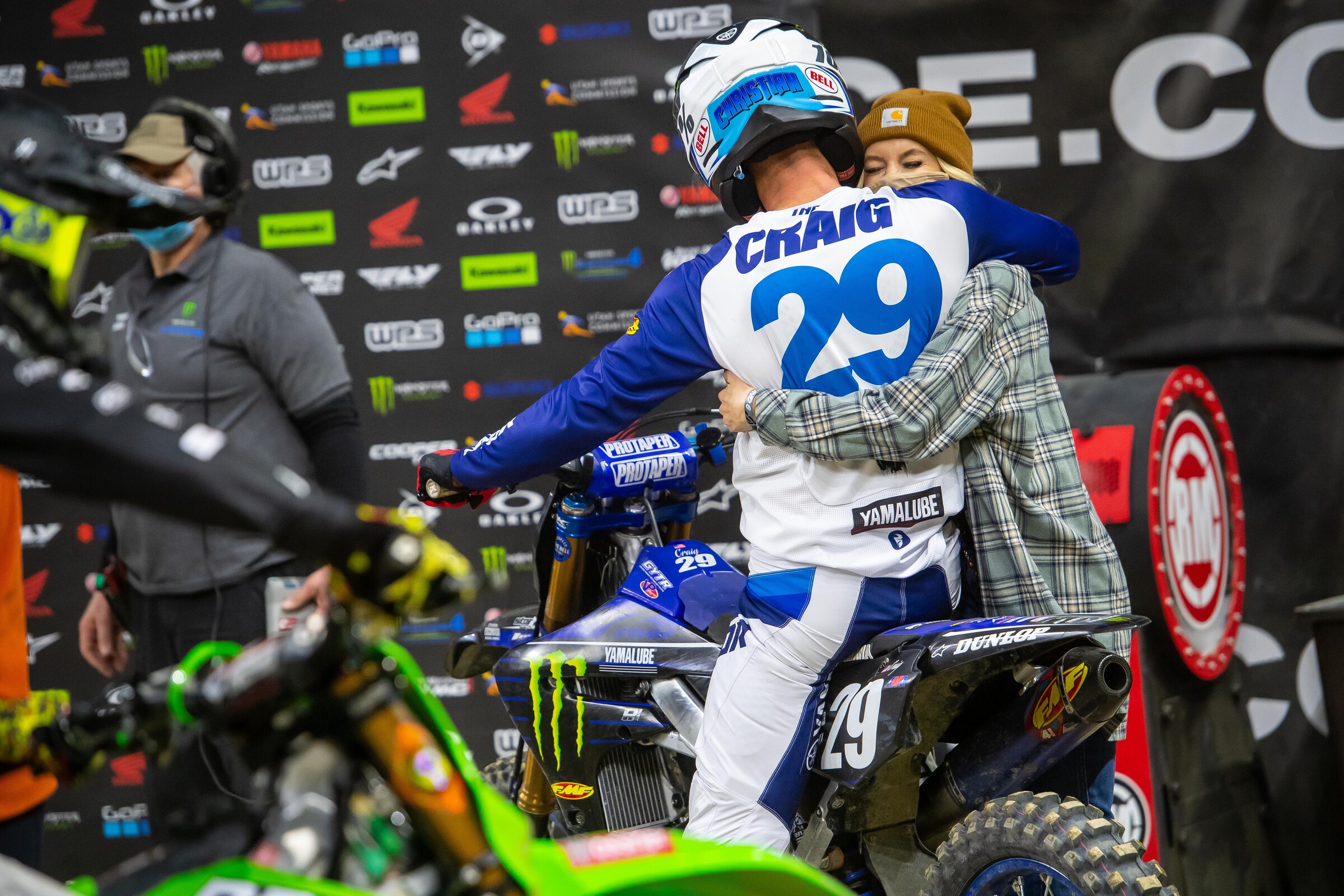 Craig greeted by his wife Paige after the race.