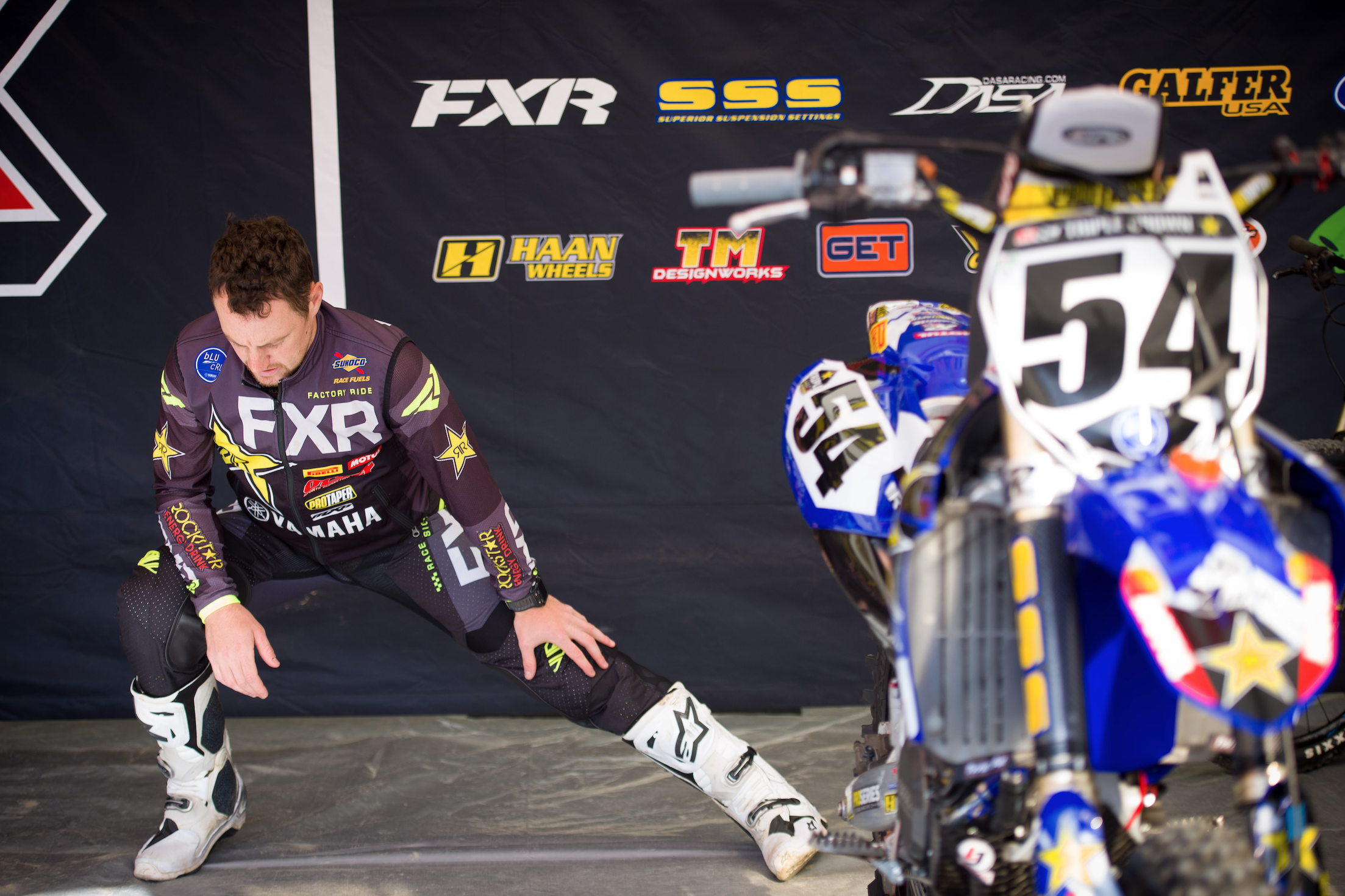 Phil does all his stretching off the bike.