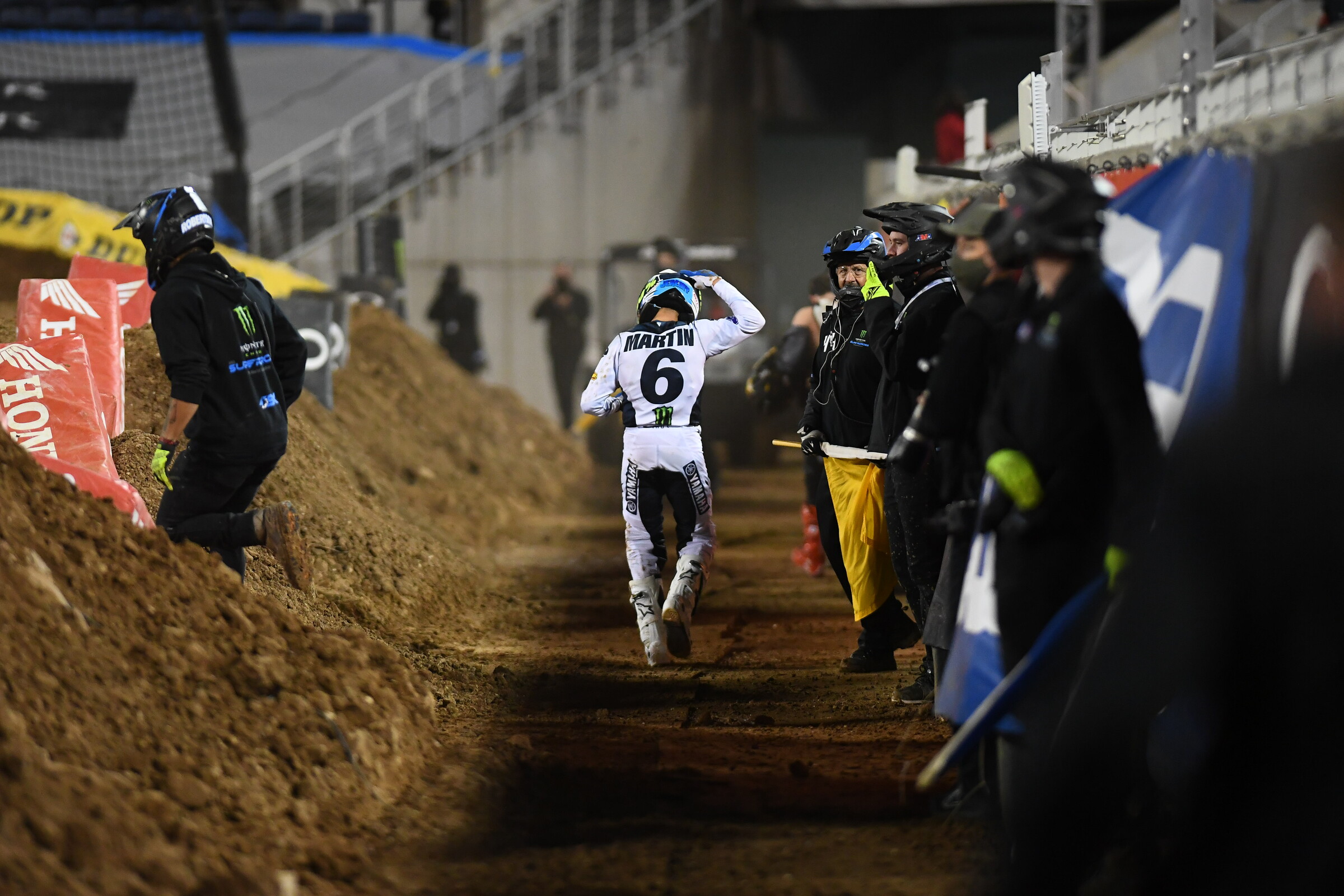 But his night ended early after a crash in the first turn of the 250SX main event took him out of the race. He appeared to have a shoulder injury after a hard hit.