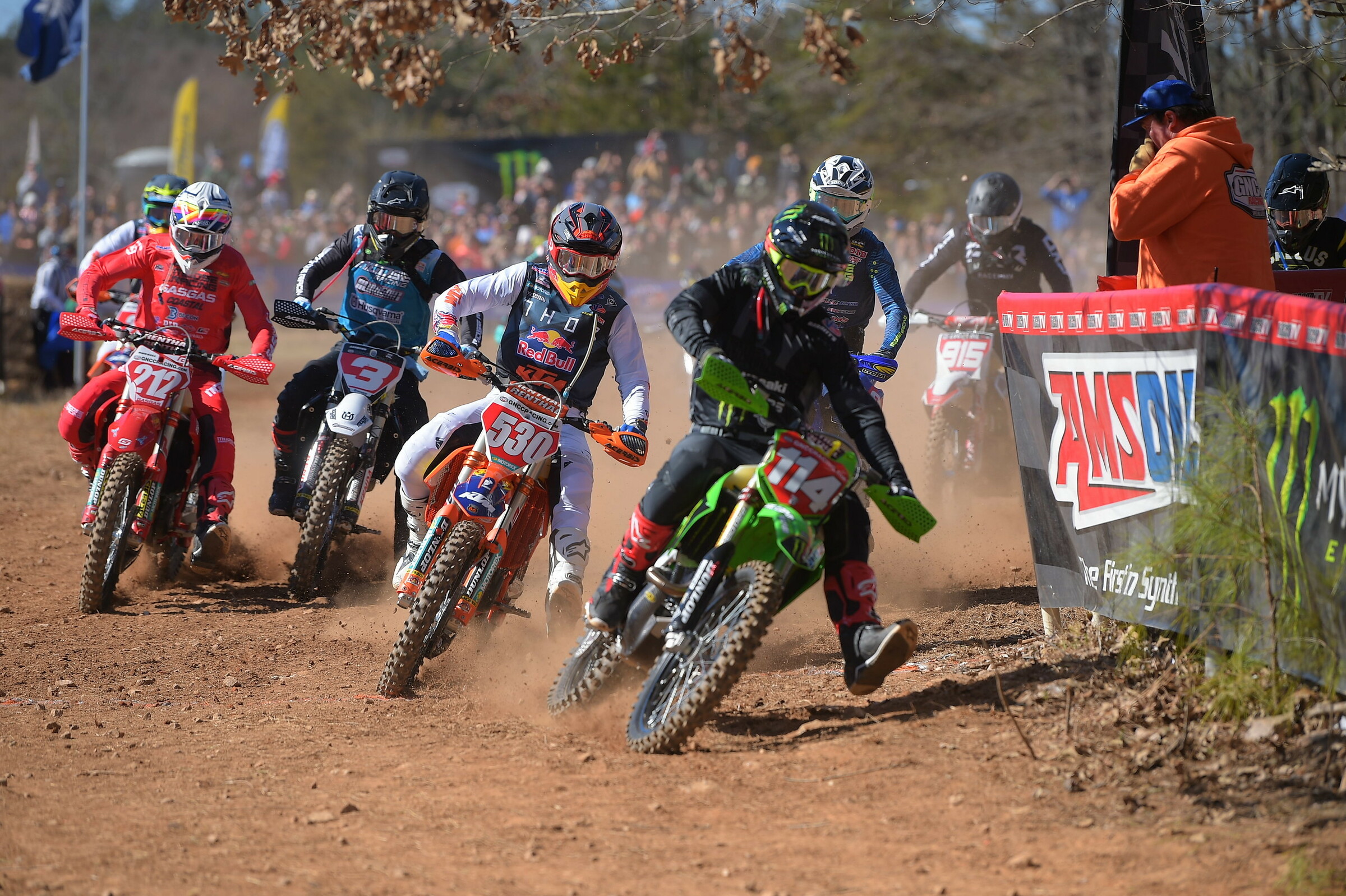 Strang grabbed the holeshot on his Kawasaki but struggled in the early laps. He came back for third.