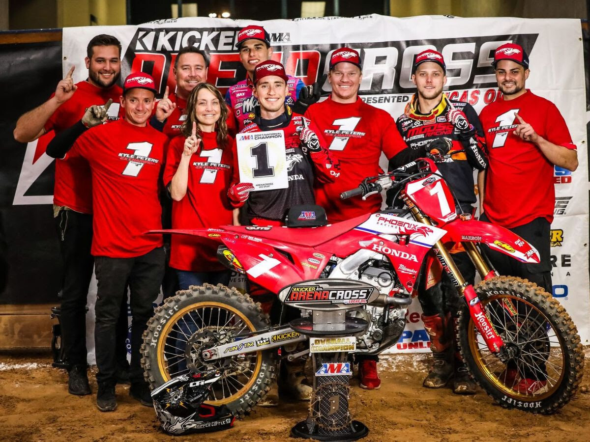 Kyle Peters & co. celebrating his championship. 