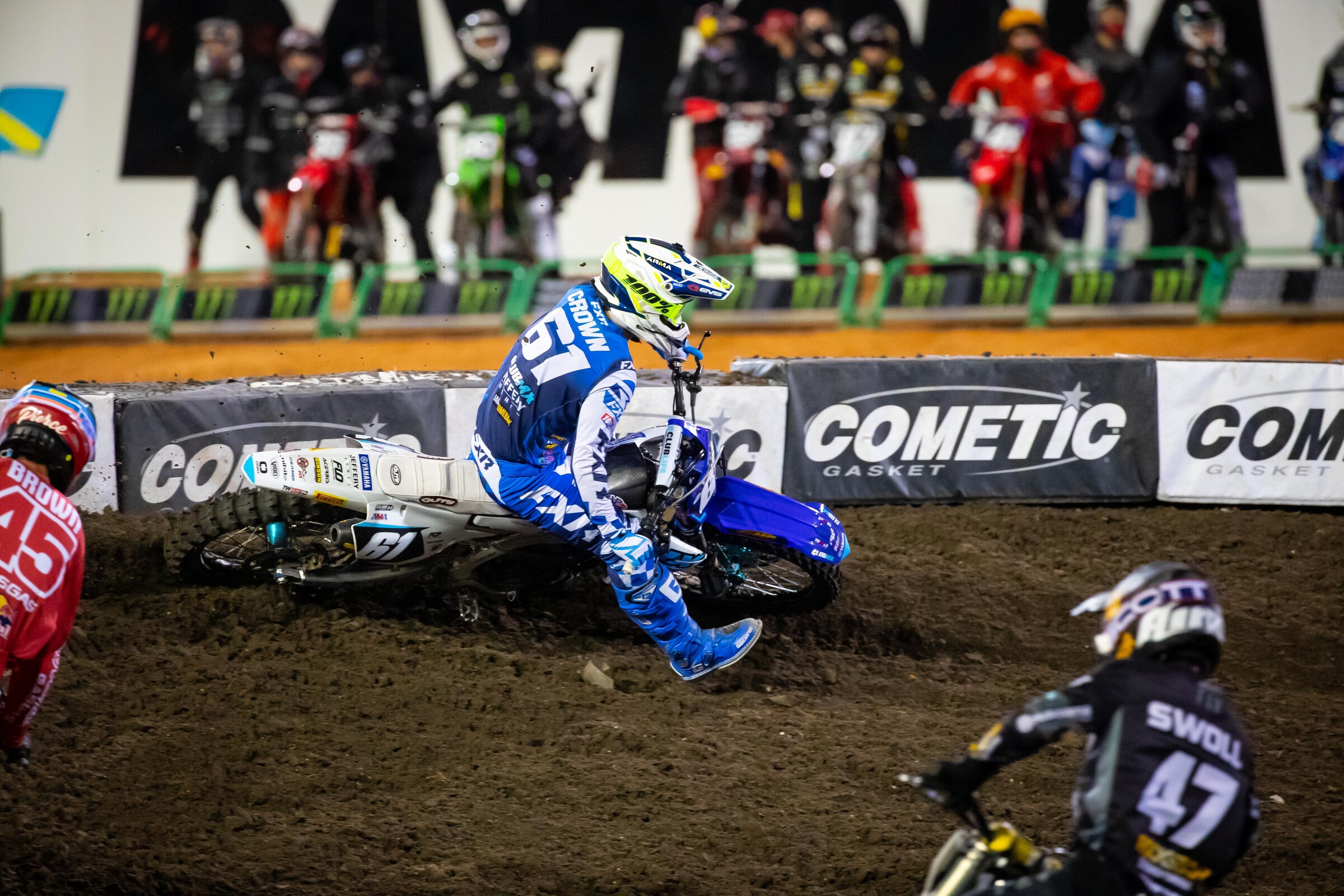 Crown ahead of Brown and Robertson in his heat race at the Daytona Supercross.