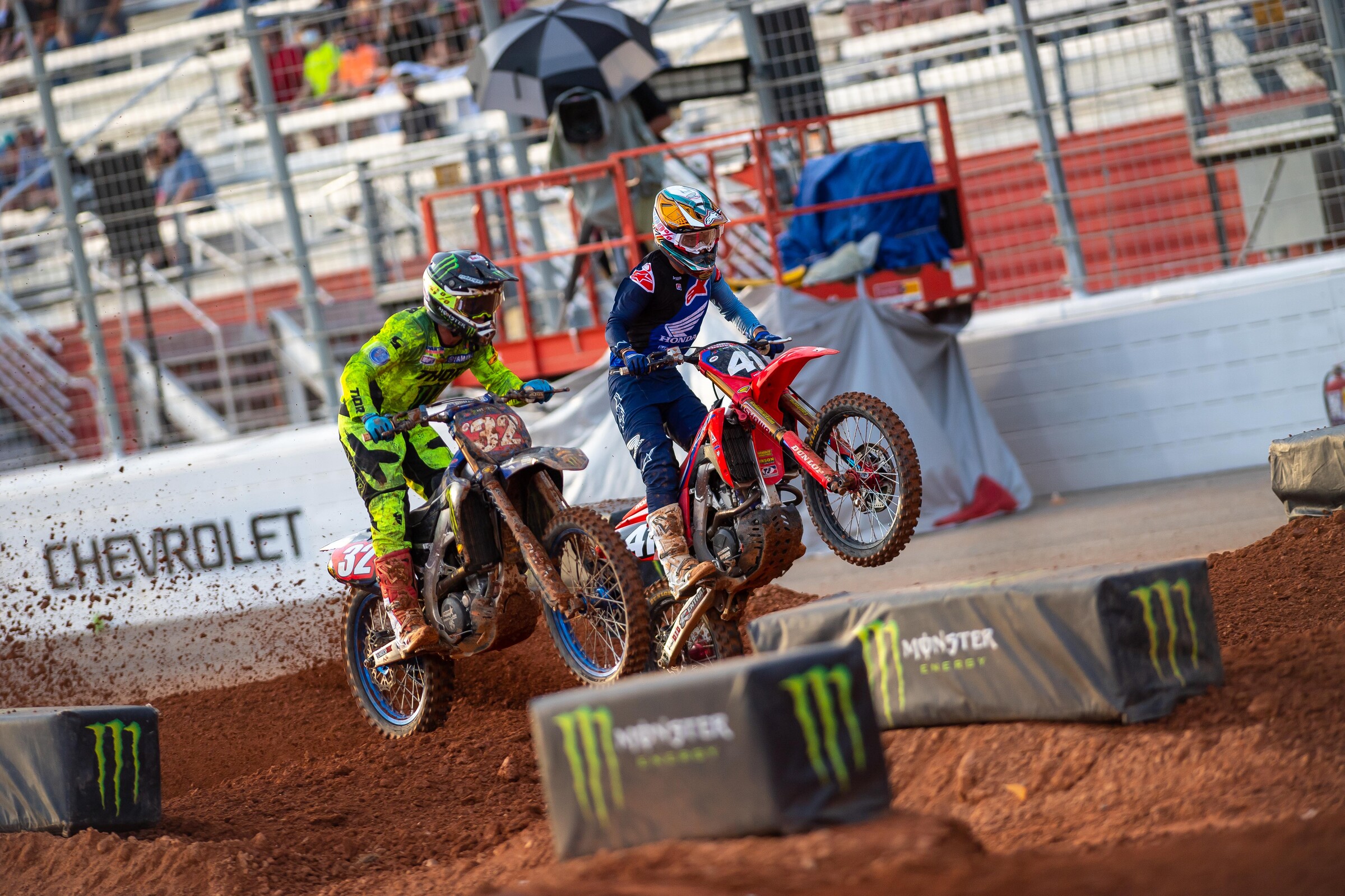 Cooper and Lawrence battling in their heat race.