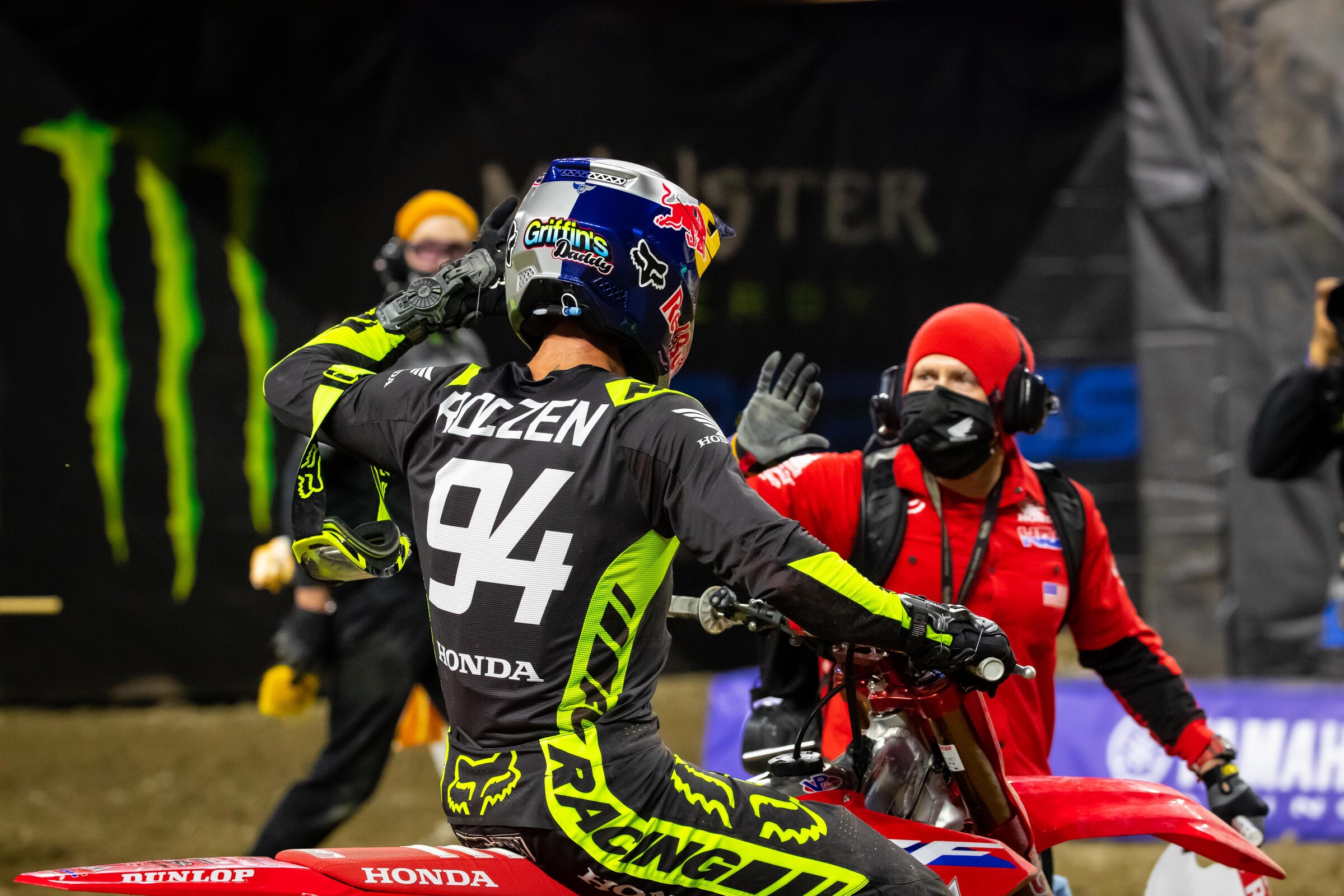 Griffin's Daddy gets a high five from mechanic Jordan Troxell.