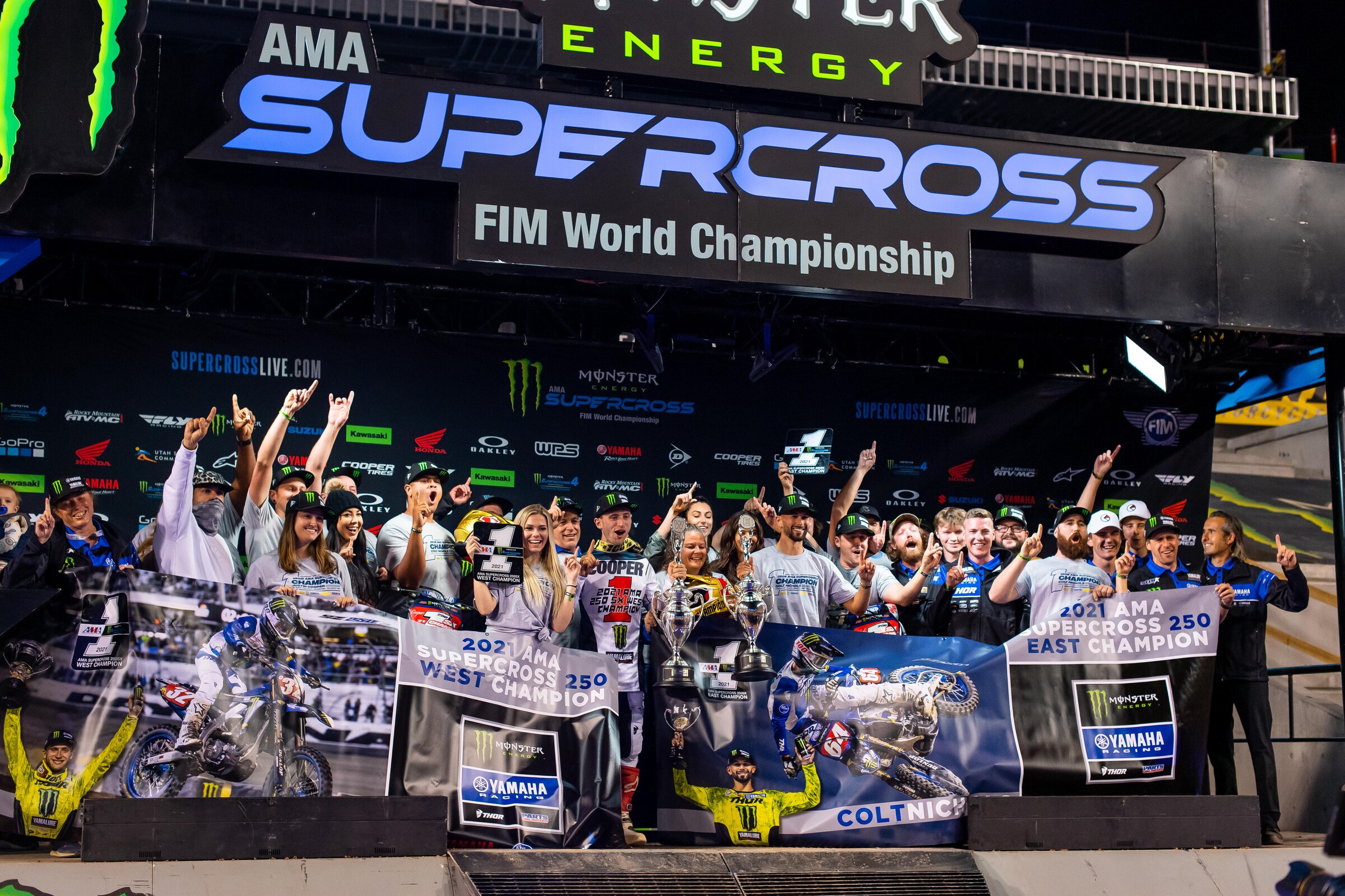 The Monster Energy/Star Yamaha Racing team celebrating Nichols and Cooper's titles.