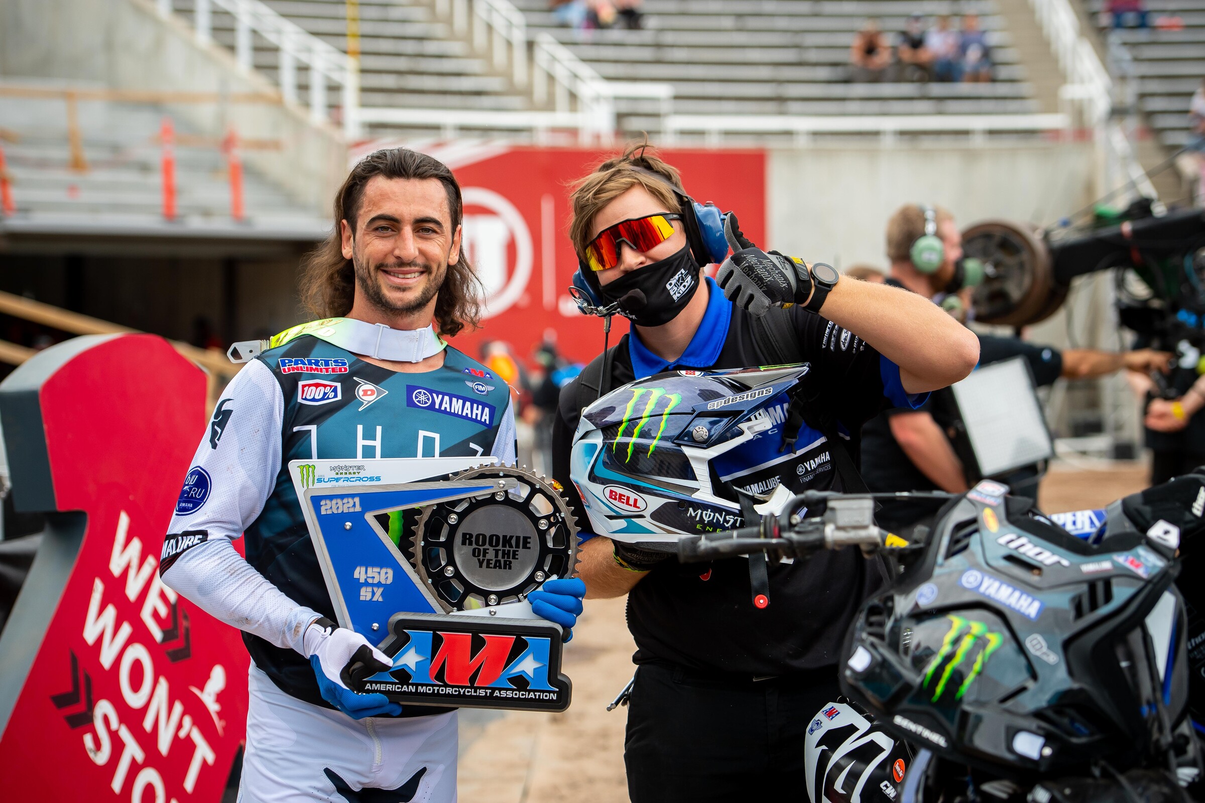 Dylan Ferrandis and his mechanic Alex Campbell with the 2021 AMA 250SX Rookie of the Year award.