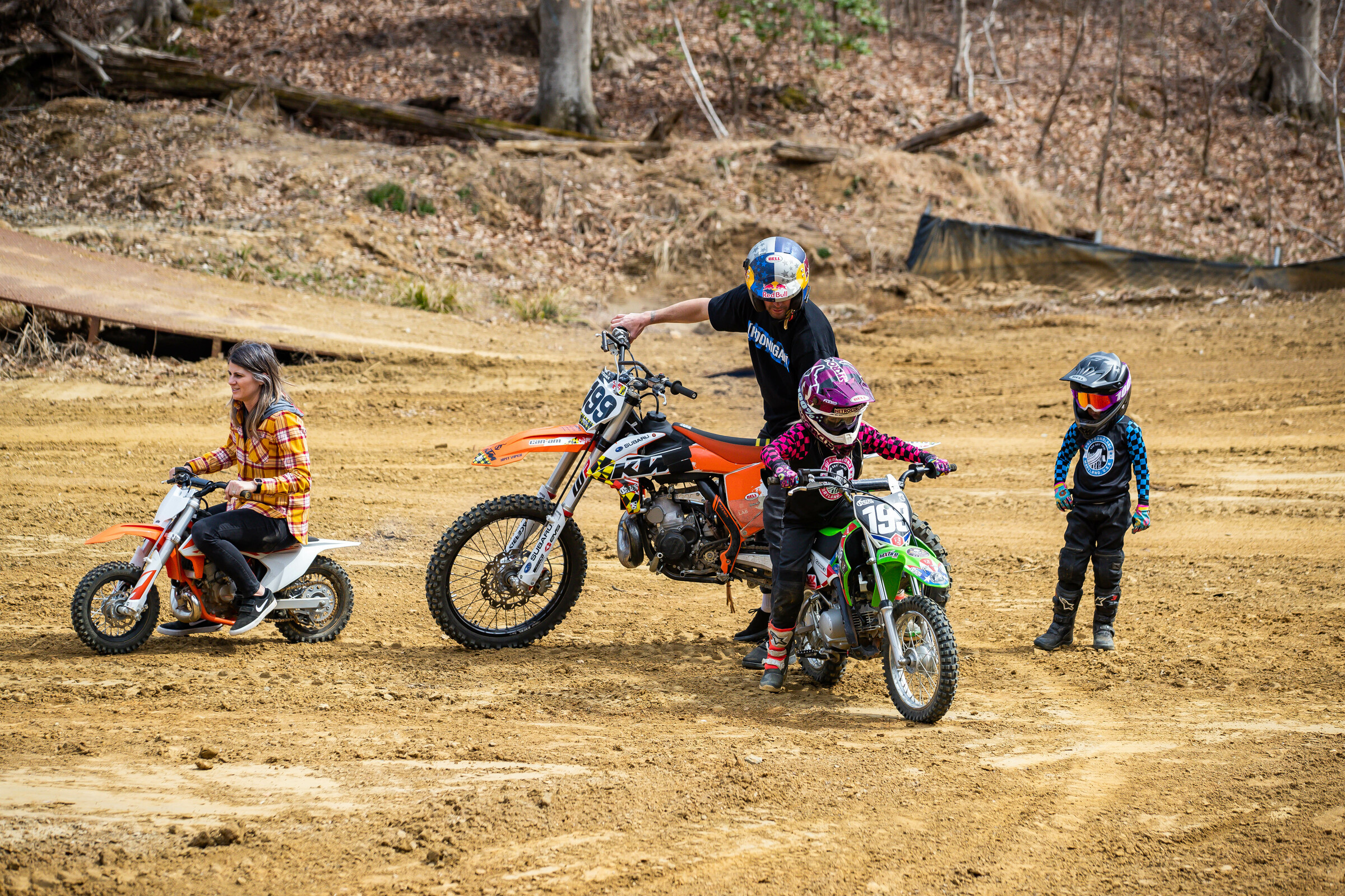 Travis Pastrana and his wife Lyn-z teach their two daughters how to ride motorcycles on their property in Maryland.