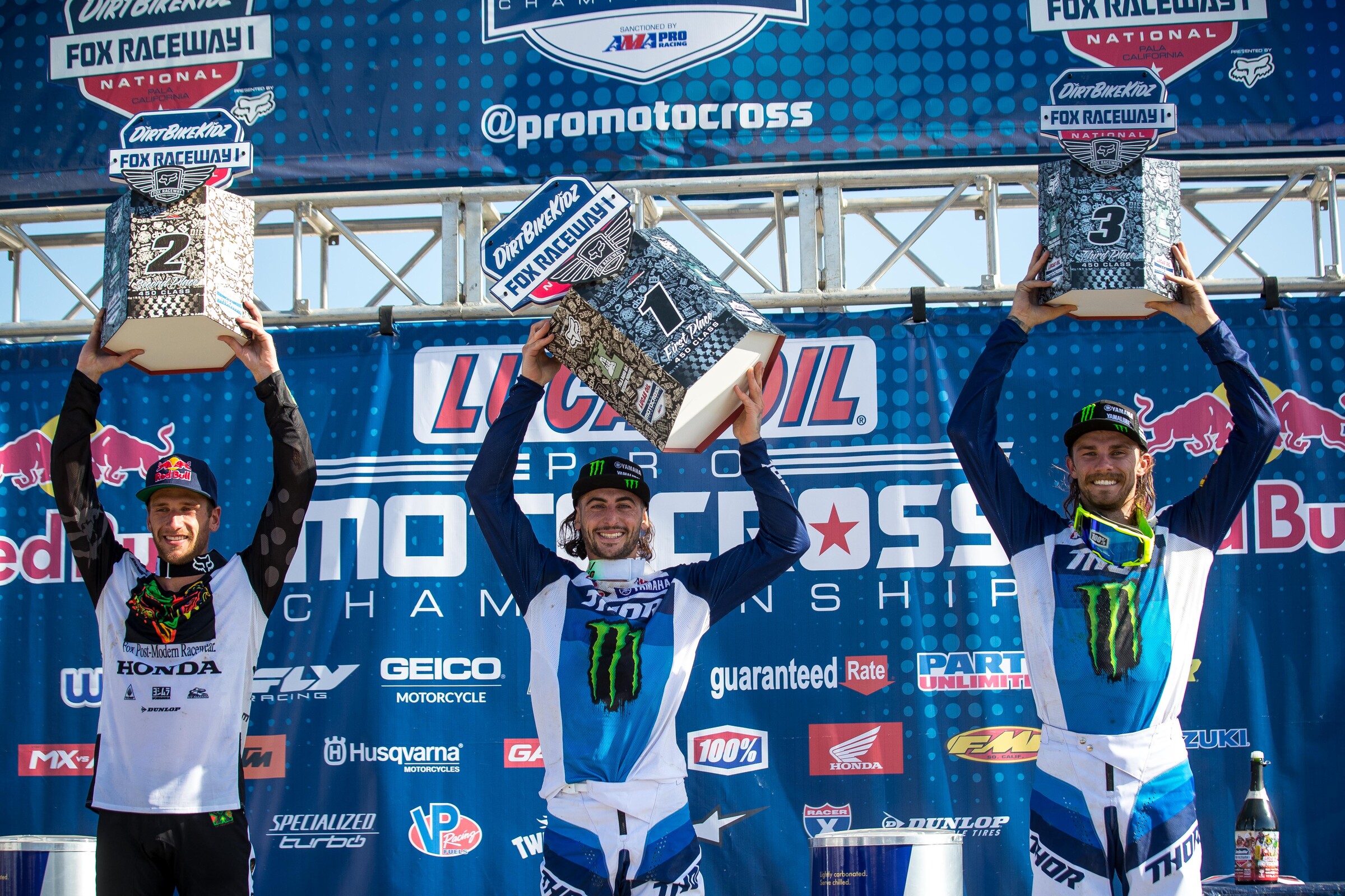 Monster Energy/Star Racing Yamaha teammates Dylan Ferrandis (center) and Aaron Plessinger (right) with Honda HRC's Ken Roczen on the 450 Class overall podium at the Fox Raceway 1 National.