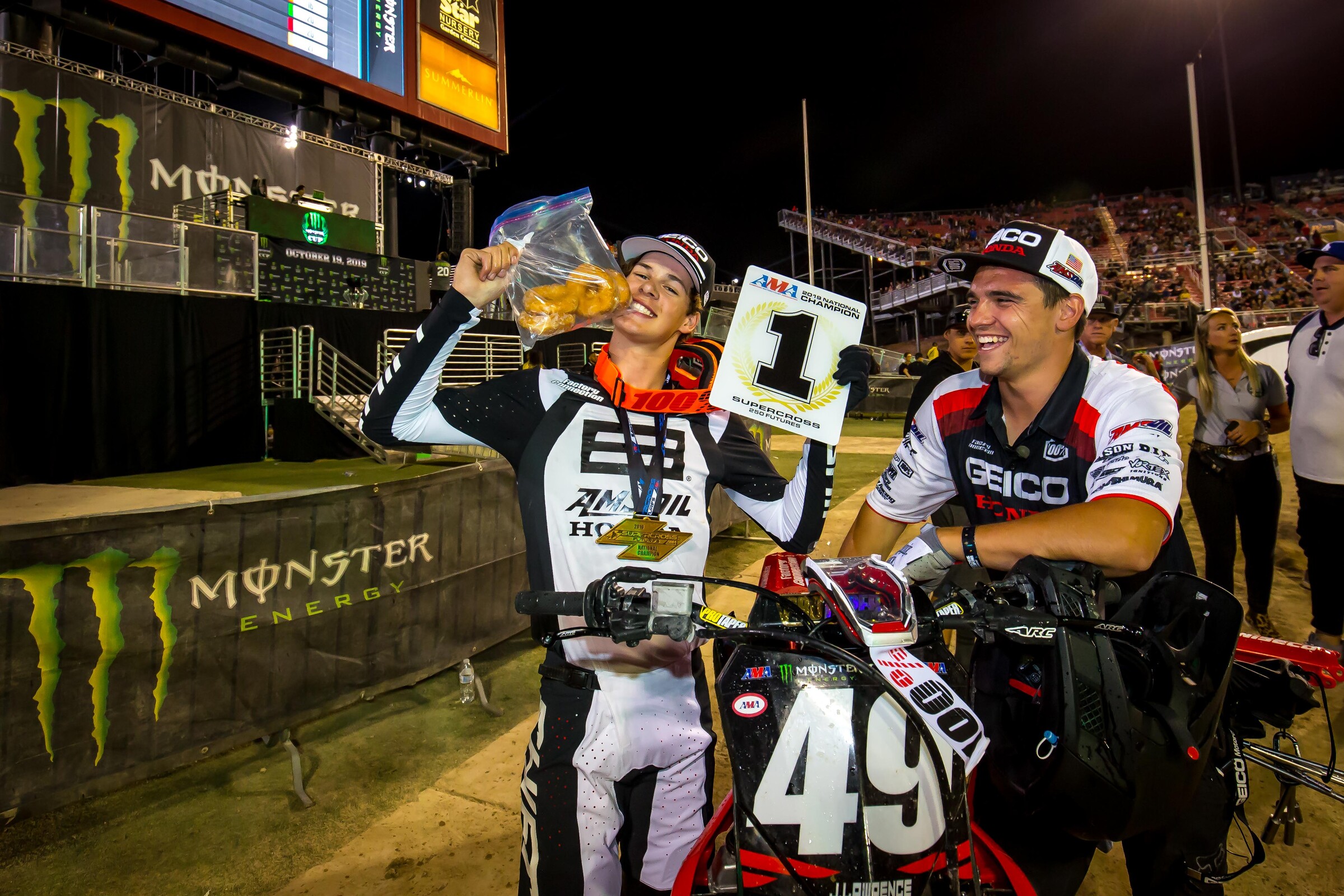 Lawrence famously posing with a bag of donuts he famously started eating from after claiming the 250 Future win at the 2019 Monster Energy Cup. Now, fast forward to 2021 and he has Jett Lawrence #18 Krispy Kreme-style merch!