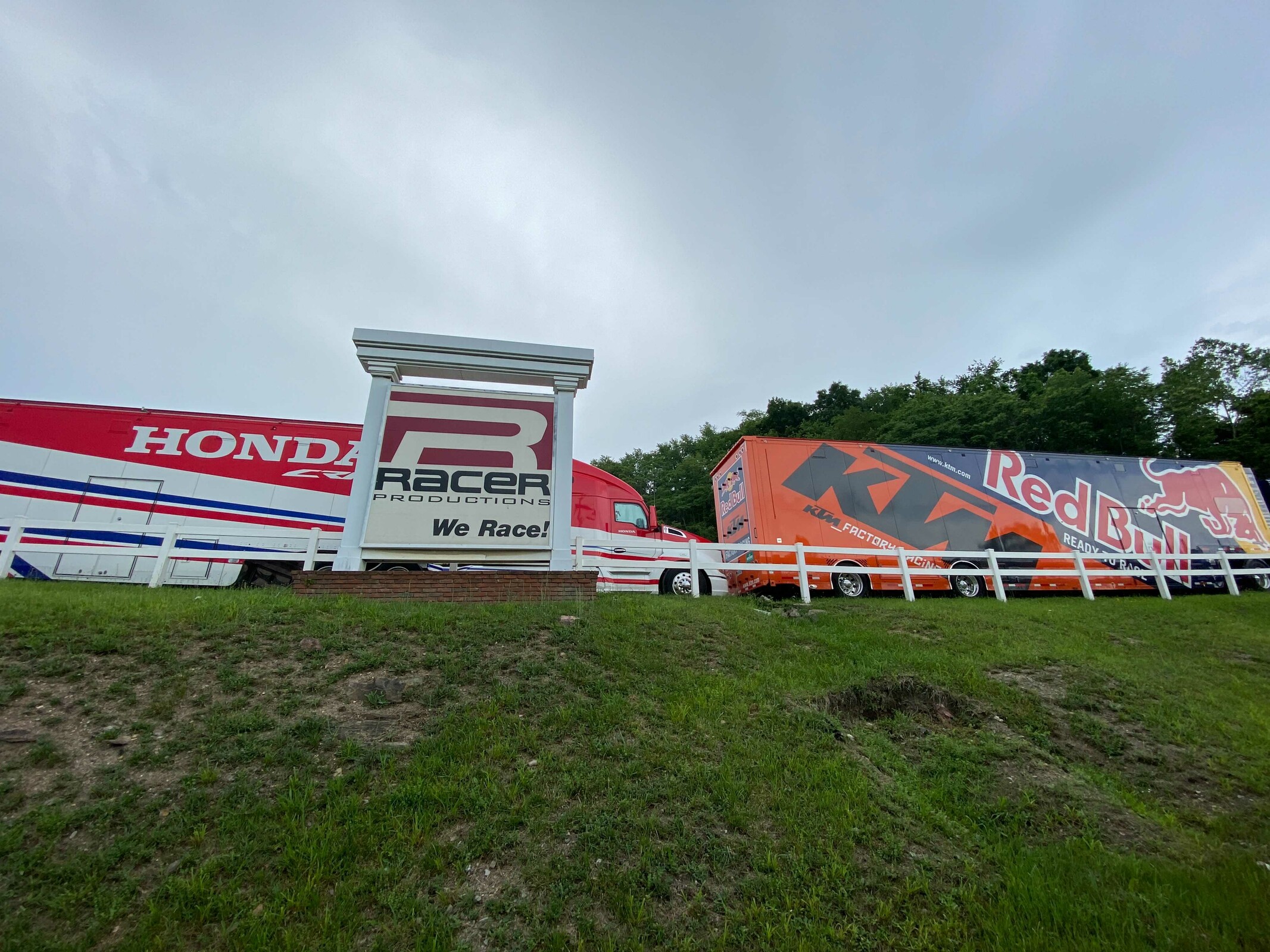 The Honda HRC and Red Bull KTM rigs out front of the Racer X office this afternoon.