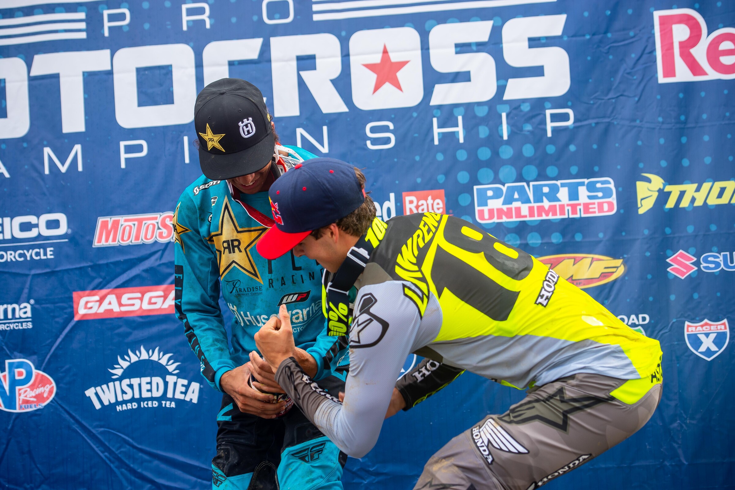 Swoll couldn't get the winner's champagne open. He needed some help from Jett Lawrence!